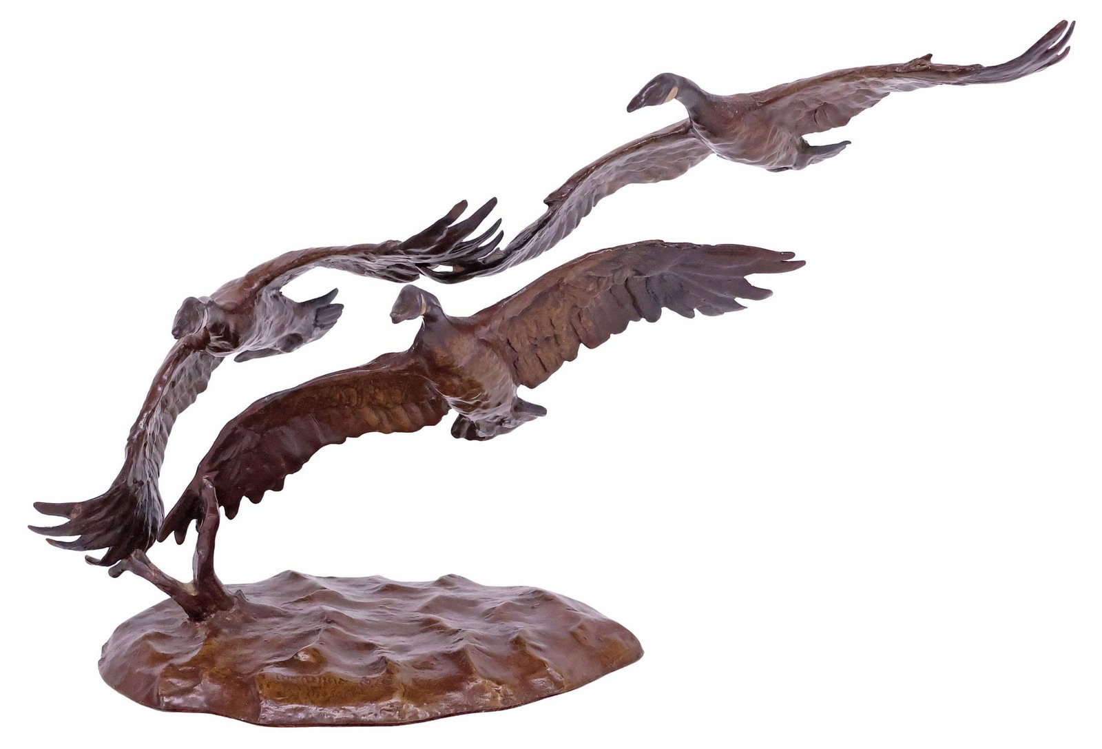 JONATHAN BRONSON (1952-2009) WILDLIFE BRONZE SCULPTURE, 'AUTUMN FLIGHT': Patinated bronze sculpture, "Autumn Flight," signed in cast Jonathan Bronson (Utah, 1952-2009), dated in cast [19]83, depicting a flock of geese, gilt-metal National Wildlife Association plaque underf