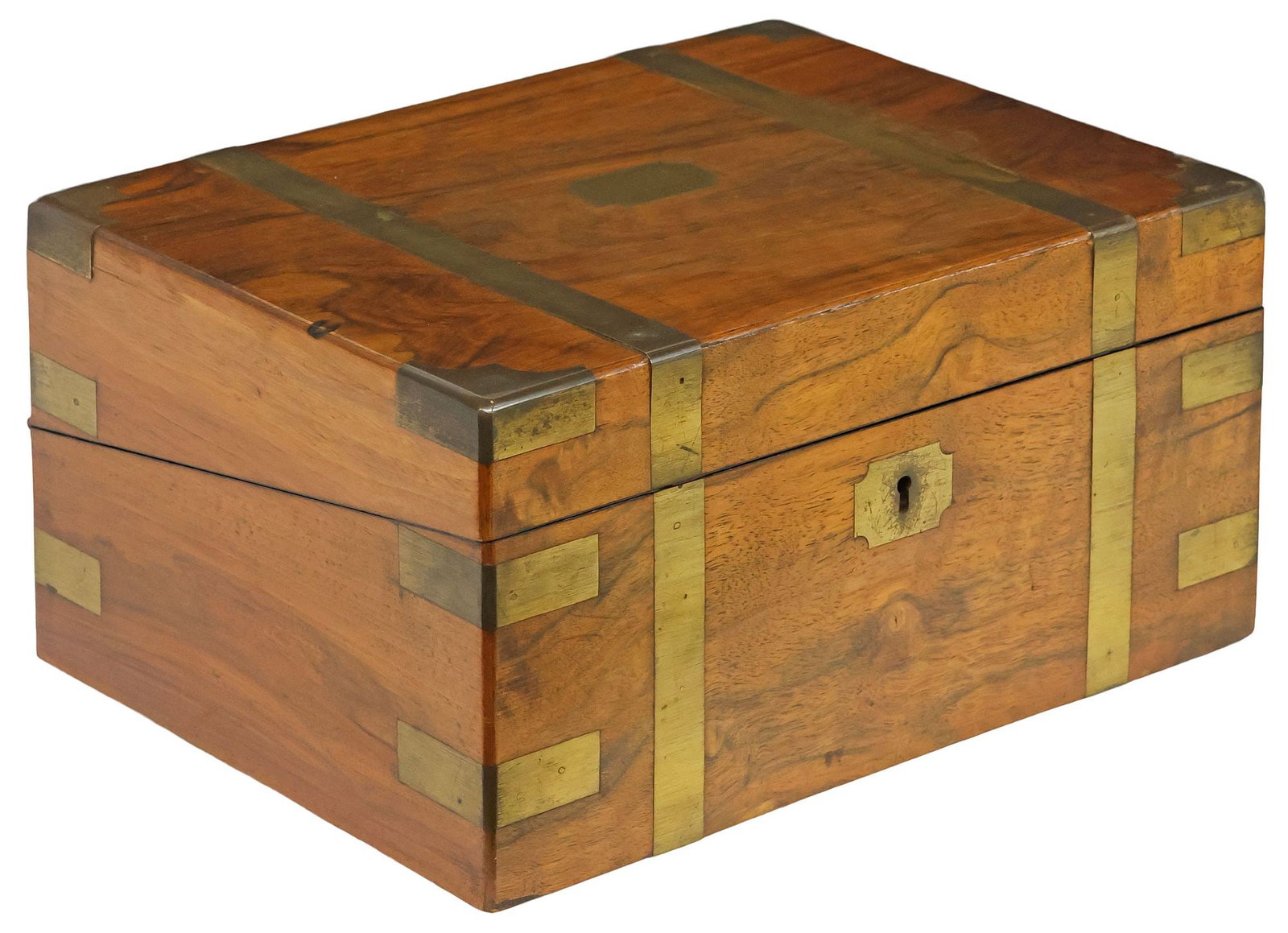 ENGLISH BRASS-BOUND FIGURED WALNUT WRITING SLOPE / TRAVEL DESK: English figured walnut writing slope/ travel desk, late 19th c., the case with brass-mounted straps and corners, a vacant cartouche on the lid opening to a gilt embossed leather writing surface, stamp