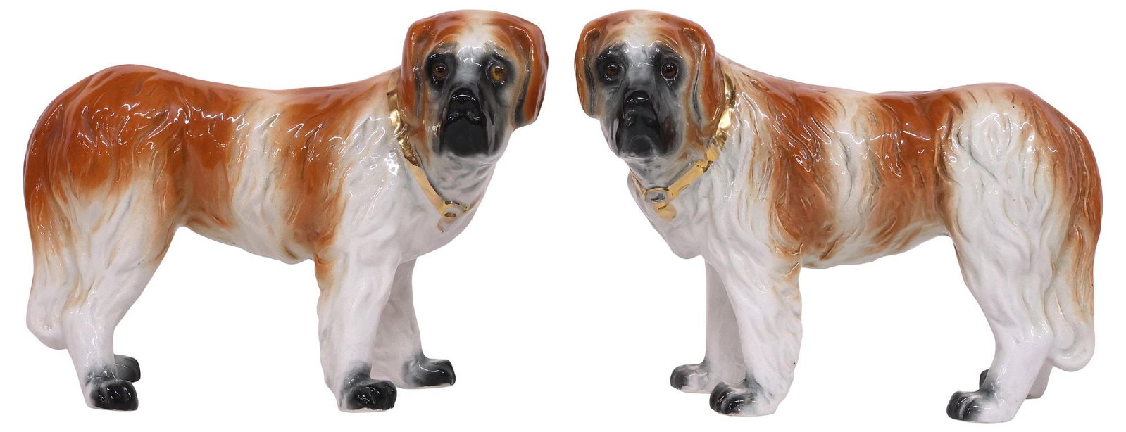 (2) LARGE ENGLISH VICTORIAN STAFFORDSHIRE ST. BERNARD MANTEL DOGS: (pair) Large English Victorian Staffordshire mantel dogs, modeled as standing Saint Bernards, with painted features and inset glass eyes, gilded collars, approx 9.75"h, 13"w, 6.25"d, 10.5lbs total