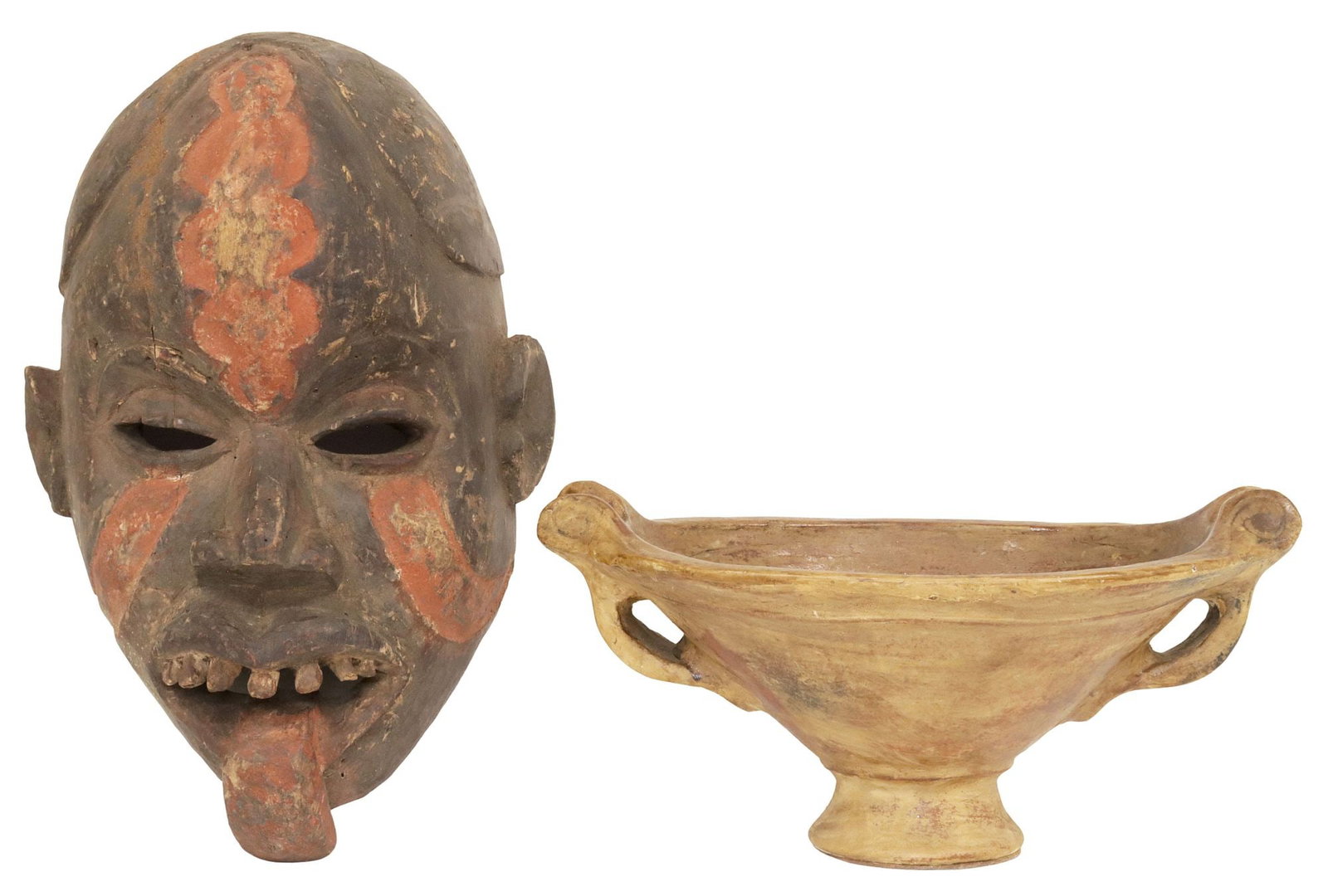 (2) DECORATIVE AFRICAN CARVED MASK & CERAMIC CENTERPIECE BOWL: (lot of 2) African decorative articles, including: (1) carved and painted wood mask, modeled as a figure with mouth agape revealing tongue, approx 18"h, 11.5"w, 8"d; (1) footed earthenware centerpiece