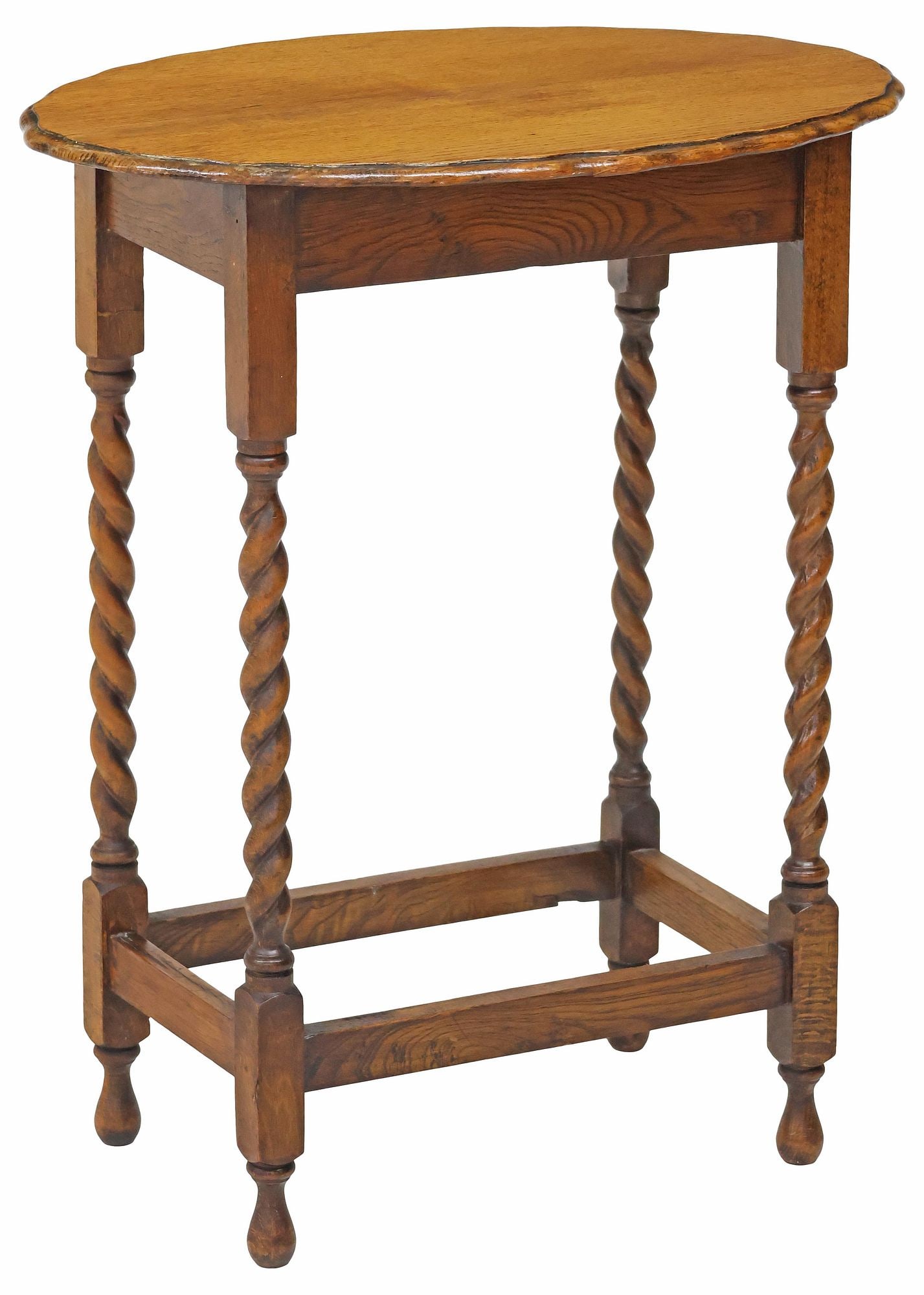 ENGLISH OAK BARLEY TWIST SIDE / OCCASIONAL TABLE: English Edwardian side table/ occasional table, early 20th c., ovular tabletop with scalloped edge, rising on barley-twist legs, joined by box stretcher, approx 29"h, 23.5"w, 17"d