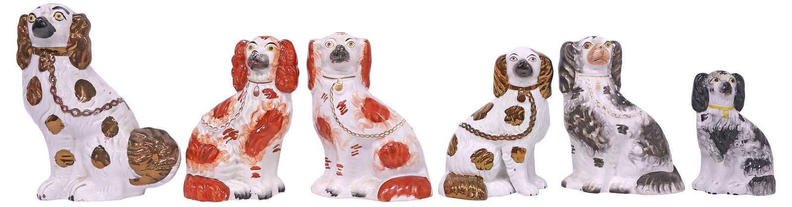 (6) ENGLISH VICTORIAN STAFFORDSHIRE MANTEL DOGS: (lot of 6) English Victorian Staffordshire mantel dogs, late 19th c., each modeled as a seated spaniel with painted features, varied sizes and decoration, including: (2) with copper luster glazed spot
