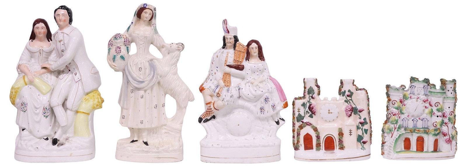 (5) ENGLISH VICTORIAN STAFFORDSHIRE MANTEL FIGURES & CLOCK TOWERS: (lot of 5) English Victorian Staffordshire flatback mantel figures and towers, 19th c., including: (2) clock towers with painted faux dials and applied foliates; (1) Scottish Highlander couple seated 