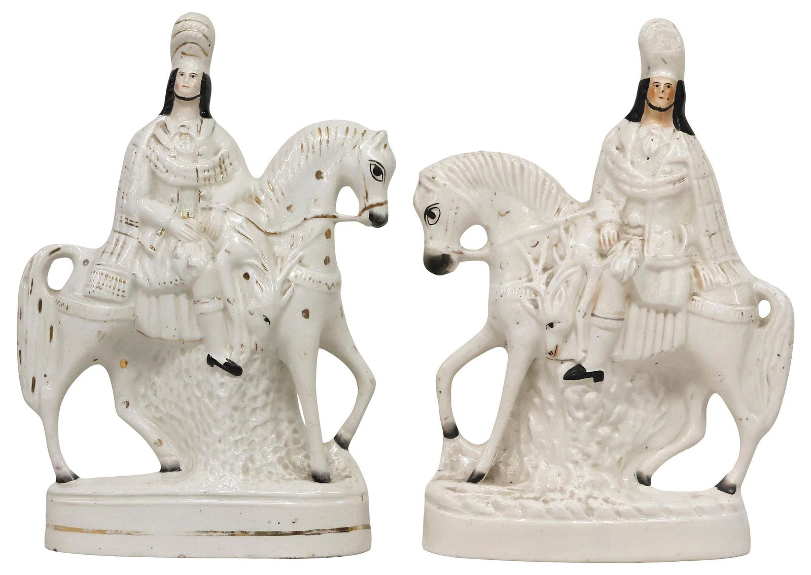 (2) ENGLISH VICTORIAN STAFFORDSHIRE 'HUNTER ON HORSEBACK' MANTEL FIGURES: (pair) English Victorian Staffordshire pottery mantel figure, 19th c., modeled as opposing Scottish hunters on horseback, with painted features and remnants of parcel-gilt decoration, on integral ovul