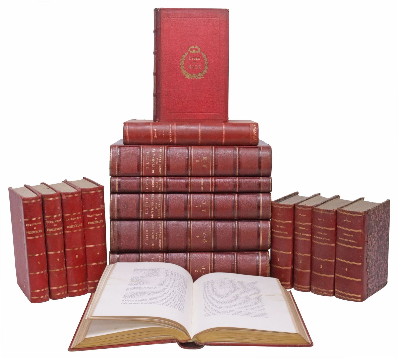 (16) FRENCH RED LEATHER-BOUND LIBRARY SHELF BOOKS, DICTIONARIES & RELIGION: (lot of 16) French library shelf books, dictionaries and theological subjects, all with gilt-embossed red leather binding, most with marbleized covers, many with raised spine bands, highlights