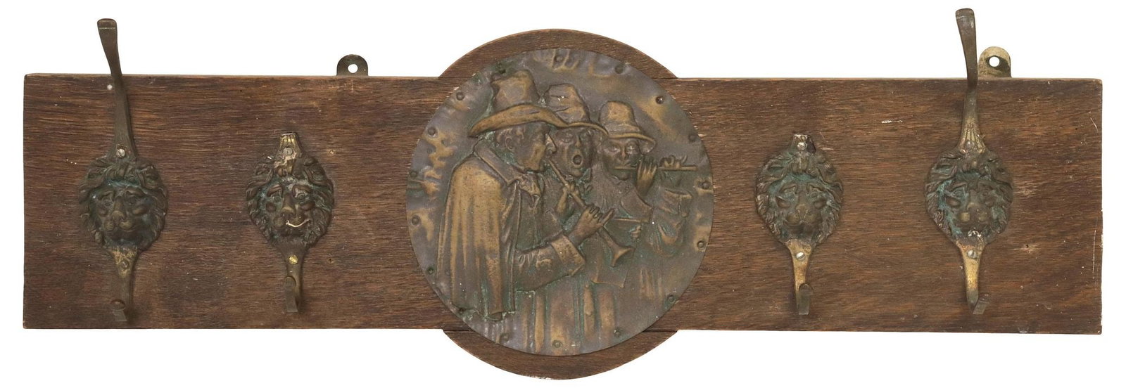 ENGLISH PATINATED BRASS & OAK WALL-MOUNTED HAT / COAT RACK: English patinated brass and oak wall-mounted hat/ coat rack, early 20th c., with central cast relief medallion depicting a trio of musicians, flanked by four lion's head mask brass hooks, losses to