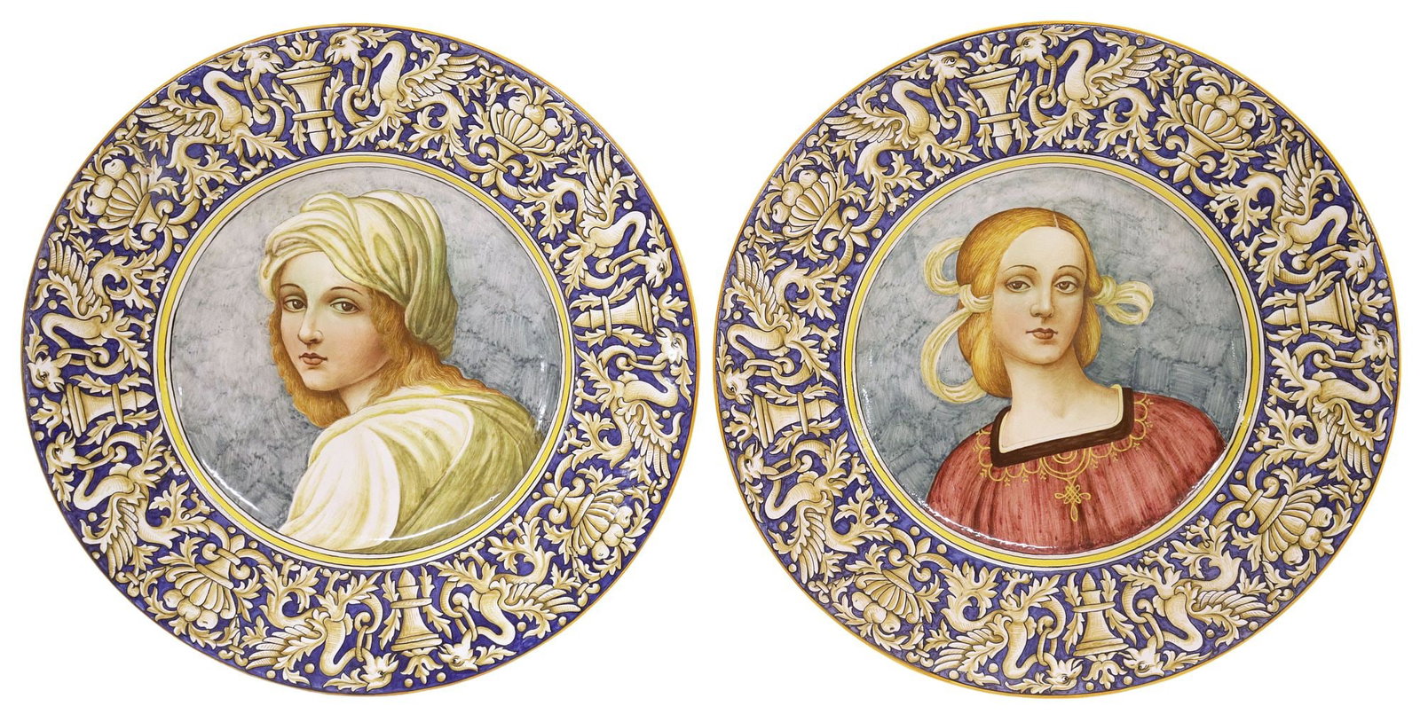 (2) ITALIAN O. FRICILLI POLYCHROME MAJOLICA PORTRAIT CHARGERS: (lot of 2) Italian polychrome majolica pottery chargers, O. Frillici, Gualdo,Tadino, 20th c., each with central female portrait in Renaissance-style dress, border with grotesques, urns, and foliate sc