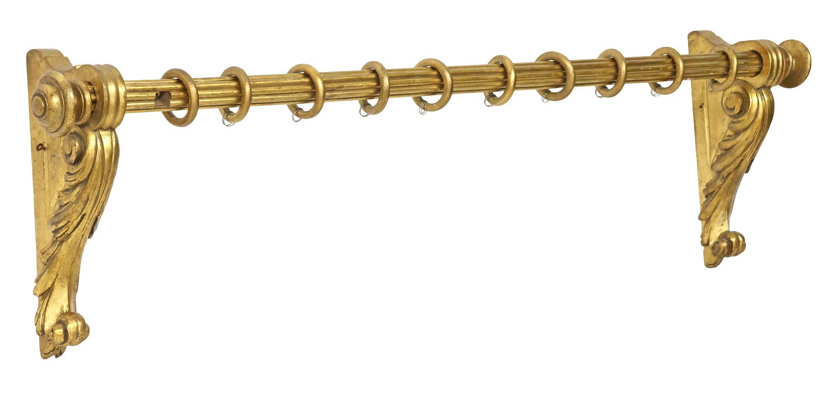 ITALIAN REEDED GILTWOOD CURTAIN VALANCE / PELMET: Italian giltwood pelmet/ curtain valance, 20th c., reeded rod ending at turned finials, supported by foliated scroll corbels, with (ten) giltwood eyelet rings, one side with geared notch for a draw co