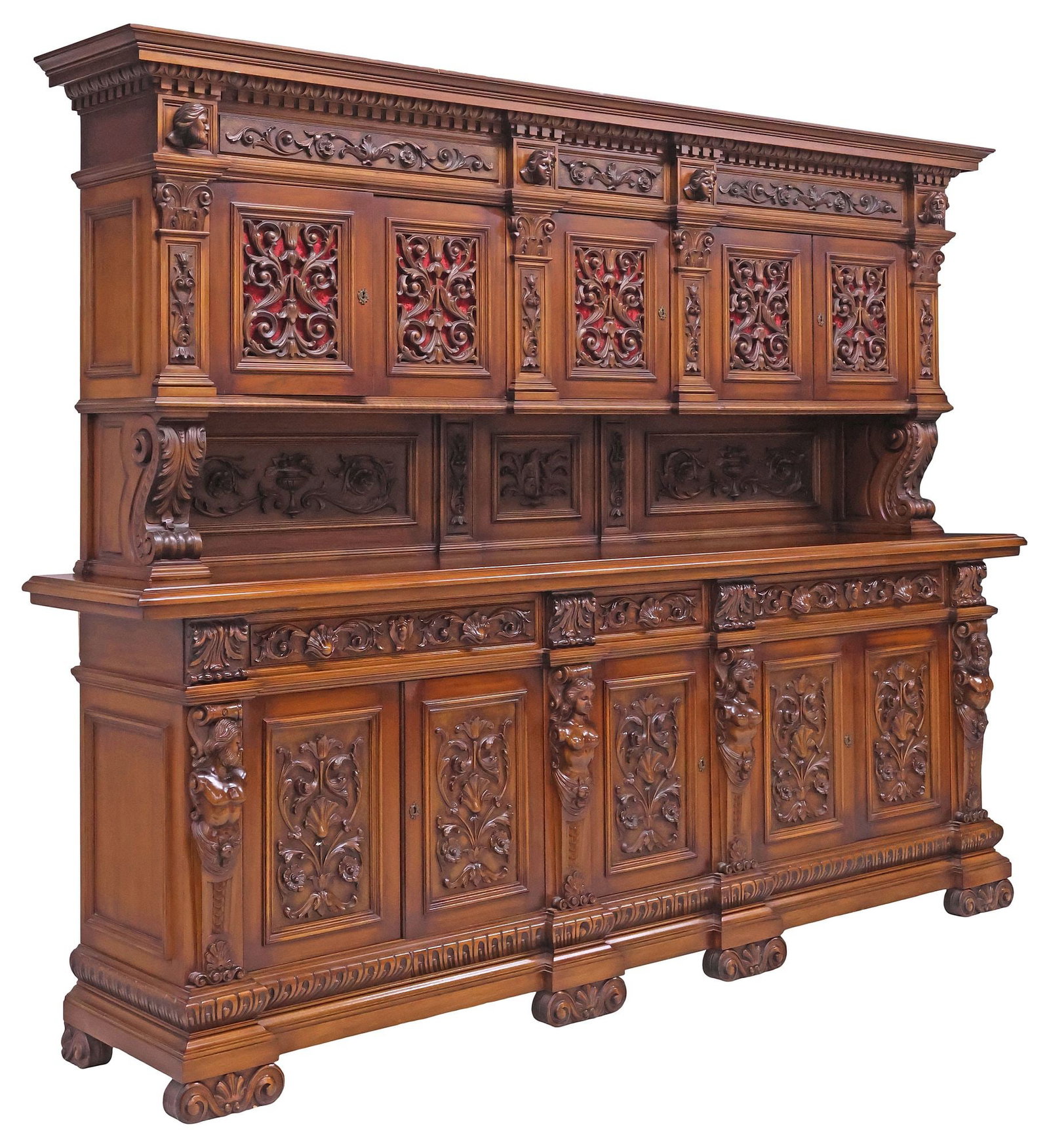 ITALIAN RENAISSANCE REVIVAL CARVED WALNUT SIDEBOARD, 120"L: Italian Renaissance Revival carved walnut sideboard, early 20th c.,, stepped cornice with dentil and egg-and-dart molded trim, above five cabinet doors with pierced scrollwork and fabric-lined backing