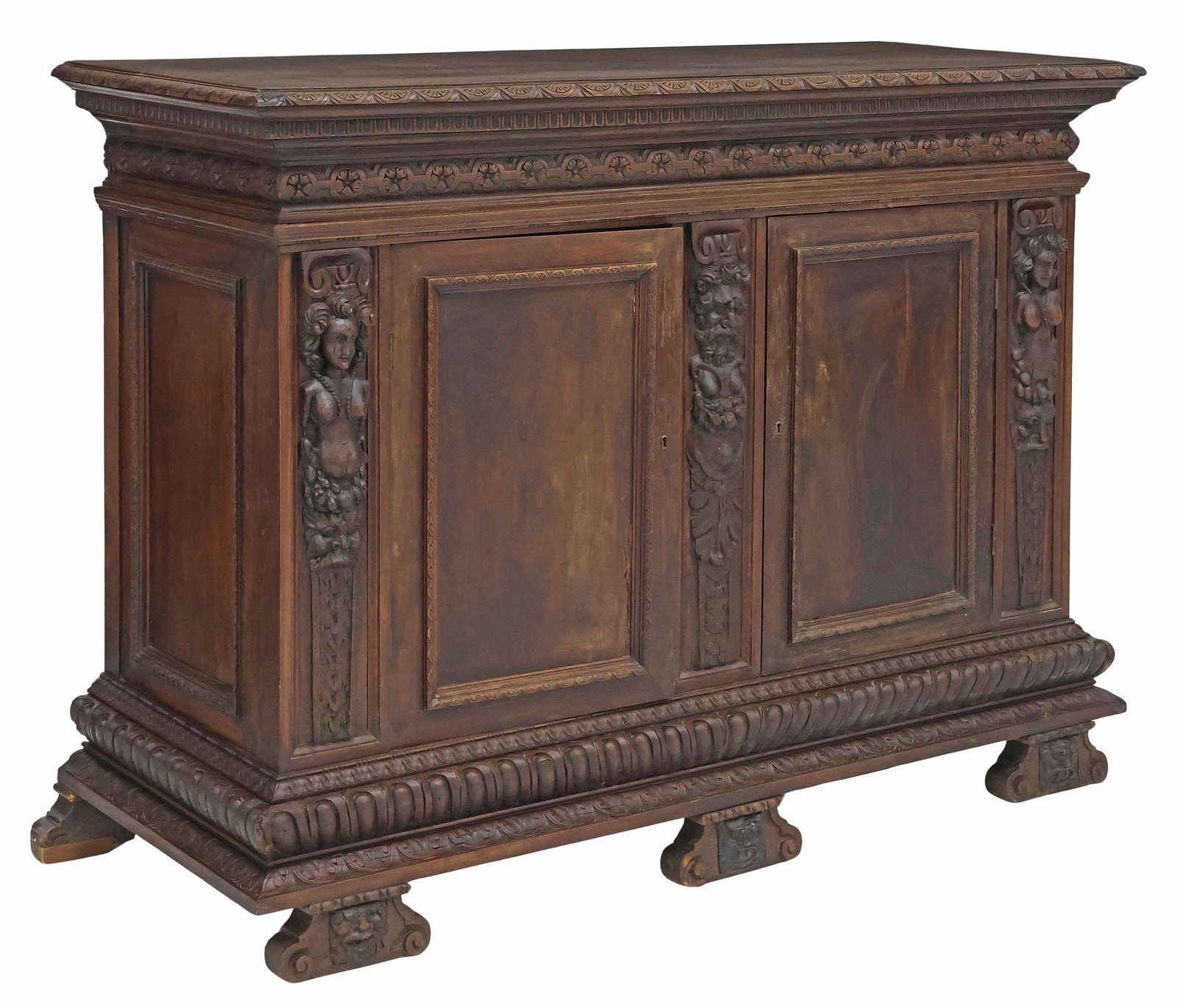 ITALIAN RENAISSANCE REVIVAL WALNUT SIDEBOARD: Italian Renaissance Revival walnut sideboard, having running ornamentation with demi figure and grotesque carving, double-door cabinet with single shelf to interior, restoration and evidence of old wo