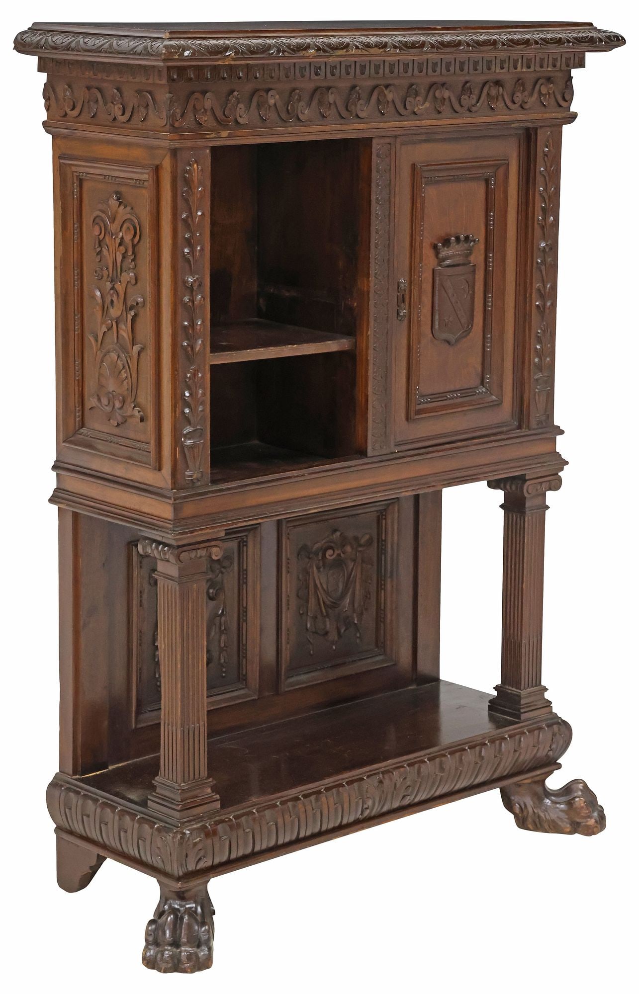 ITALIAN RENAISSANCE REVIVAL CARVED WALNUT HALL CABINET: Italian Renaissance Revival walnut credence cupboard, early 20th c., foliate-molded cornice, over scrollworked frieze, fitted with single cabinet door centering crowned heraldic shield, enclosing fixe