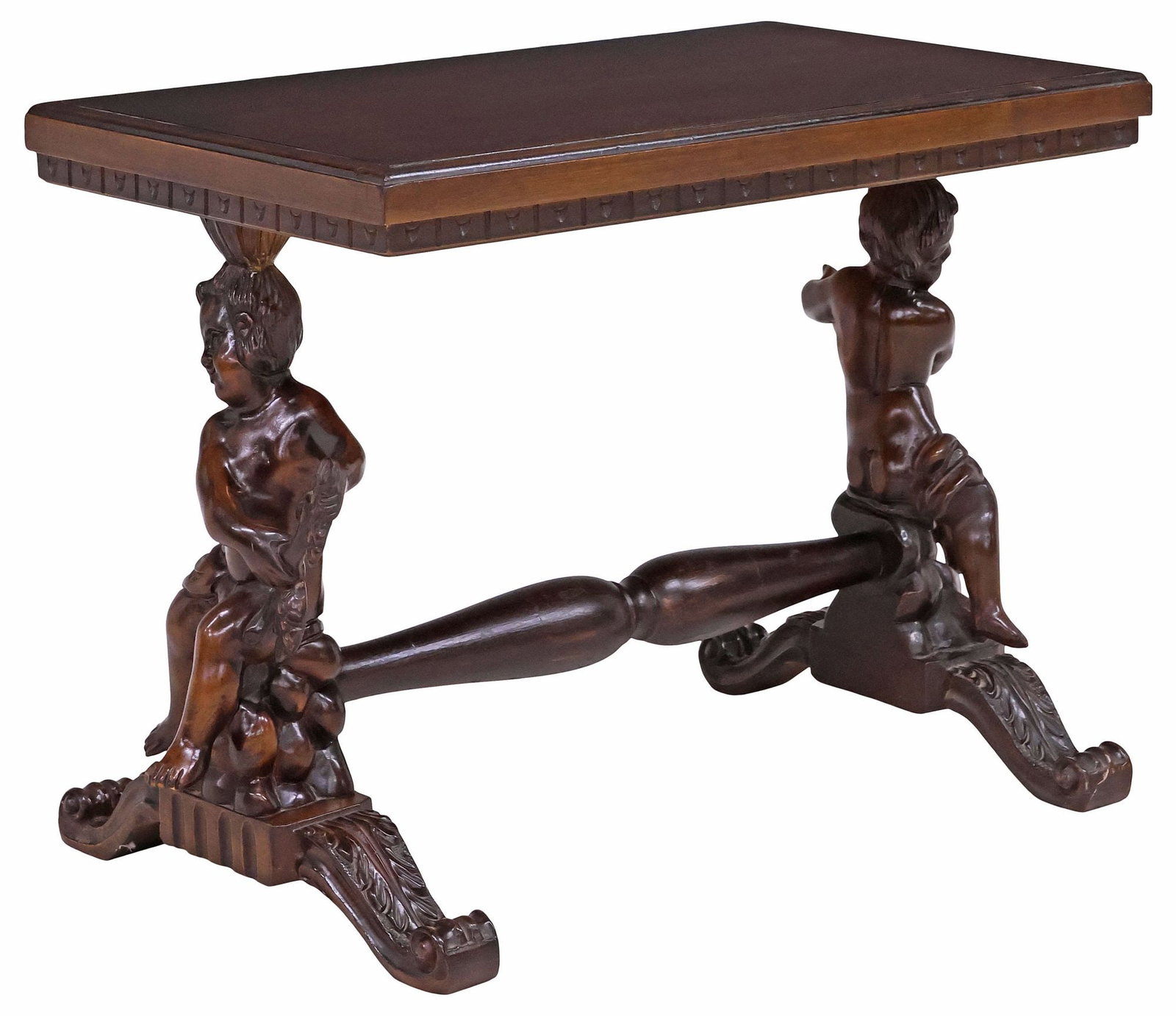 ITALIAN RENAISSANCE REVIVAL FIGURAL CARVED PUTTI SIDE TABLE: Italian Renaissance Revival carved walnut side table, early 20th c., having rectangular top, on figural supports in the form of putti, each seated on a naturalistic base, joined by H-stretcher, ending