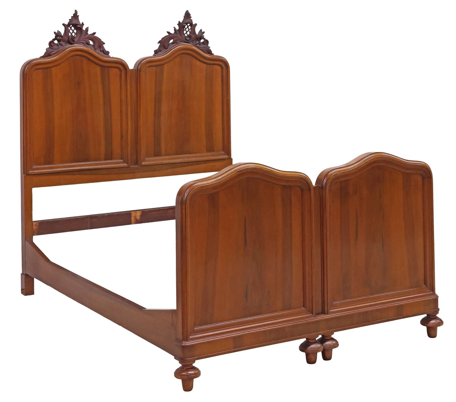 ITALIAN CARVED WALNUT DOUBLE-ARCH BED: Italian carved walnut bed, 19th c., having pierced scrolling foliate crest with latticework, paneled head and foot boards with double-arch cornice, on turned feet, exterior: approx 67.5"h, 82"l,