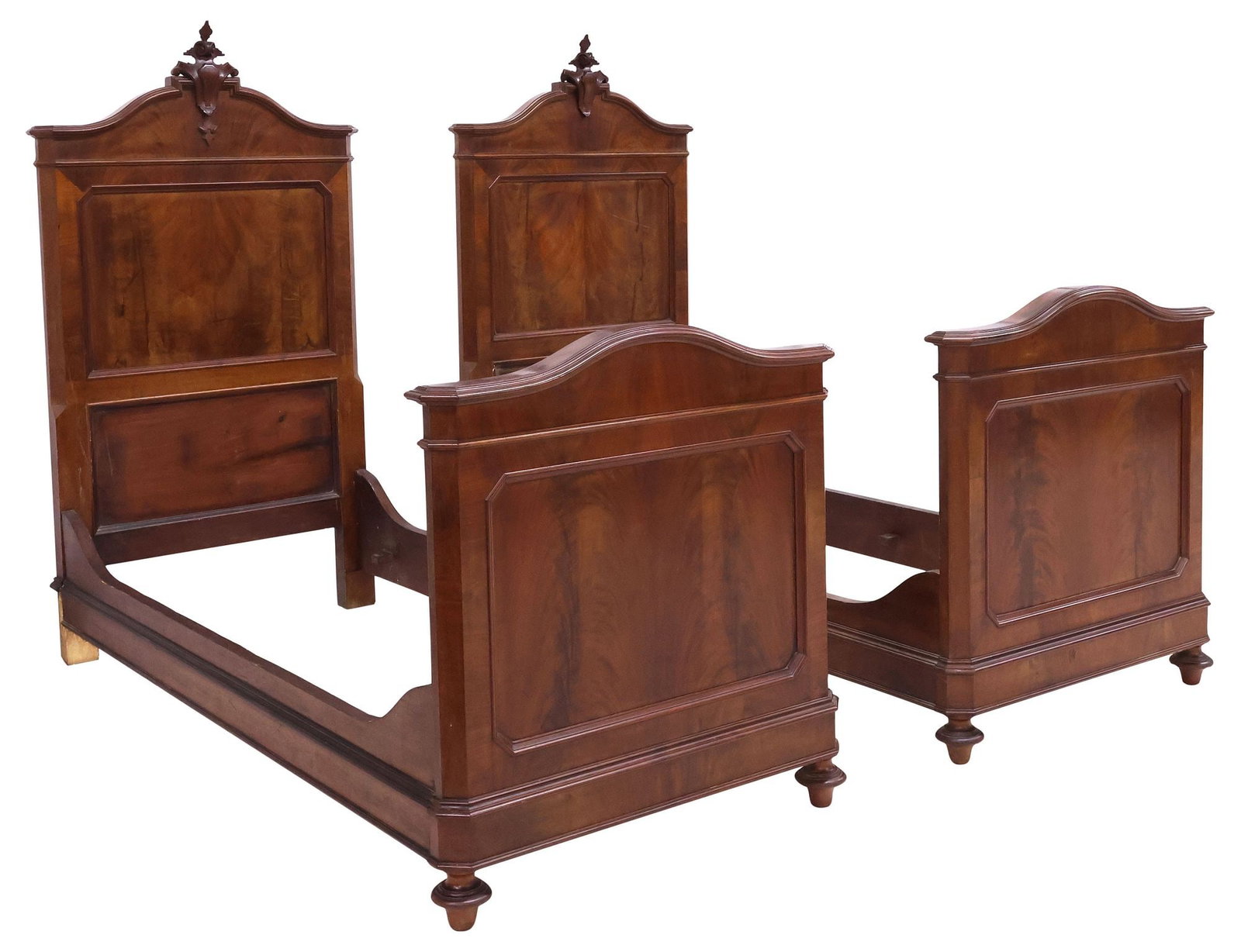 (2) ITALIAN FIGURED WALNUT BEDS, 19TH C.: (pair) Italian figured walnut beds, 19th c., scrolled cartouche-form crest, paneled head and foot boards with arched cornice, on turned feet, exterior: approx 65.75"h, 80"l, 36.5"w,