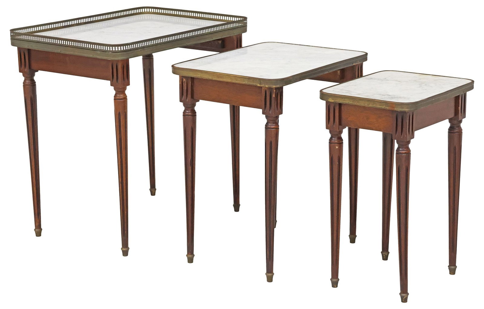 (3) FRENCH LOUIS XVI STYLE MARBLE-TOP MAHOGANY NESTING TABLES: (lot of 3) French Louis XVI style mahogany nesting tables, early 20th c., each having inset marble top with metal trim, rising on tapering fluted legs, ending on brass-cap feet, largest: approx