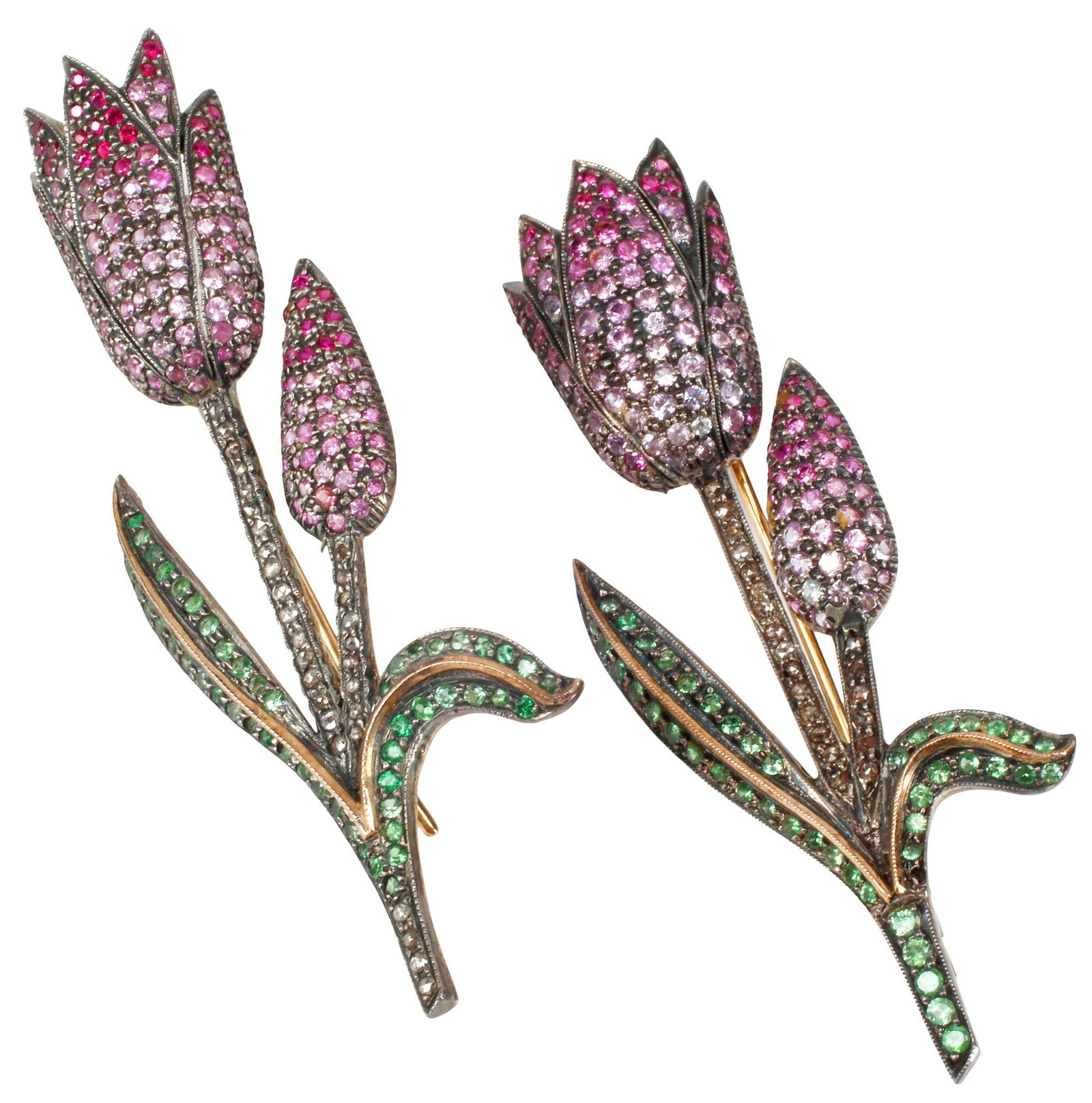 (2) ESTATE ANTIQUE SILVER, DIAMOND & MULTI-COLOR GEMSTONE TULIP BROOCHES: (pair) Estate antique silver brooches, each of tulip form, silver frames with gold accents, set with numerous uncut diamonds (stalk) and multicolor synthetic sapphires, bar pin testing as 14kt yellow 
