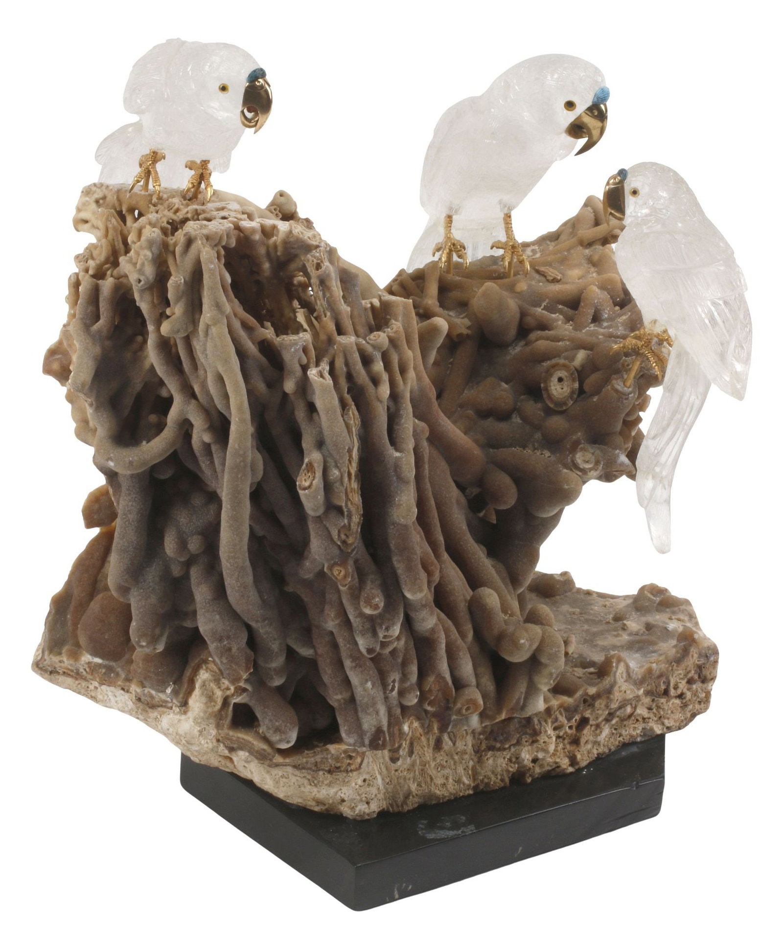 CARVED ROCK CRYSTAL PARROTS & NATURAL SPECIMEN FORMATION SCULPTURE: Carved hardstone parrot group, modeled as three rock crystal birds, gilt metal beaks with inlaid blue accents, perched upon a natural specimen-form base, on black marble plinth, overall: approx 13.5"h