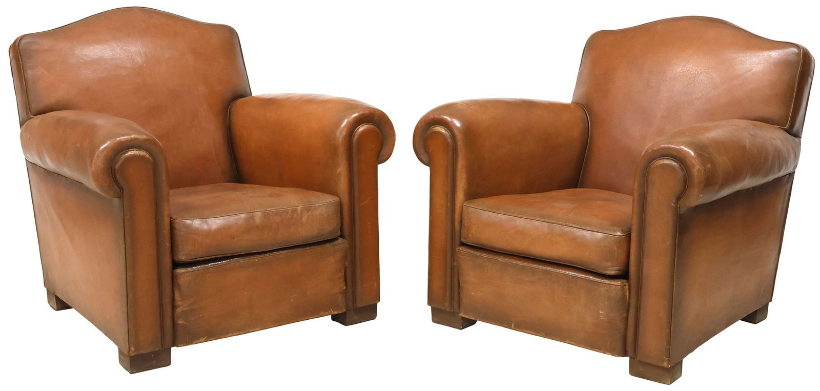 (2) FRENCH ART DECO PERIOD TAN LEATHER CLUB CHAIRS: (pair) French Art Deco period club armchairs, c.1930s, each having arched back and rolled arms in worn tan leather upholstery, with nailhead trim, removable seat cushion, rising on block feet, approx