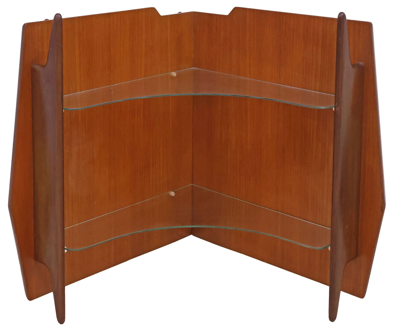 ITALIAN MID-CENTURY MODERN TEAK & GLASS WALL-MOUNTED CORNER SHELF: Italian mid-century modern teak corner shelf, c.1960s, shaped panel wall mounts, with two fixed-height glass shelves, approx 30.5"h, 34"w, 21"d