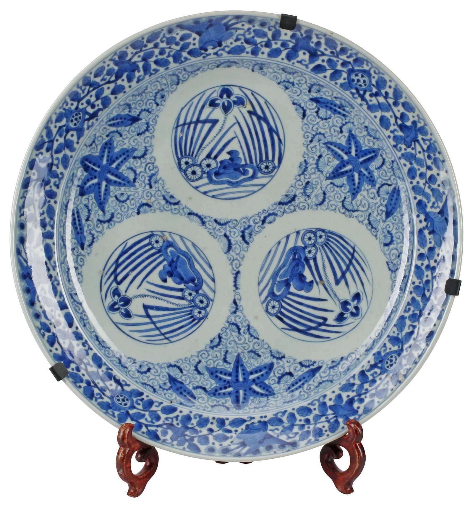 JAPANESE BLUE & WHITE ARITA WARE PORCELAIN CHARGER: Japanese Arita ware blue and white porcelain charger, Meiji period (1868-1912), with waterfowl and iris roundels, among floral motifs and birds on scrolled foliate ground, character mark underfoot, ap
