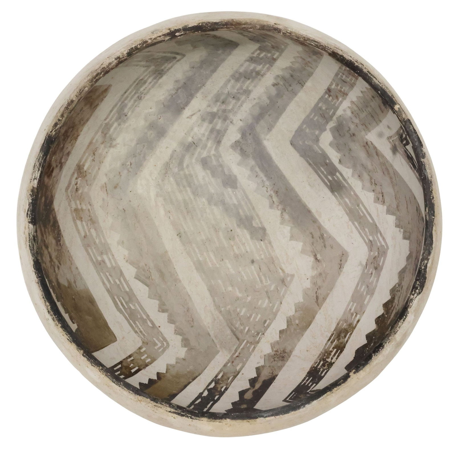 ANASAZI BLACK-ON-WHITE POTTERY BOWL: Anasazi (possibly Kayenta) black-on-white pottery bowl, painted on the interior with dentate and checkered zigzag bands, four angular bird motifs about the exterior, approx 4"h, 7.25"w, 1.5lbs **Prove
