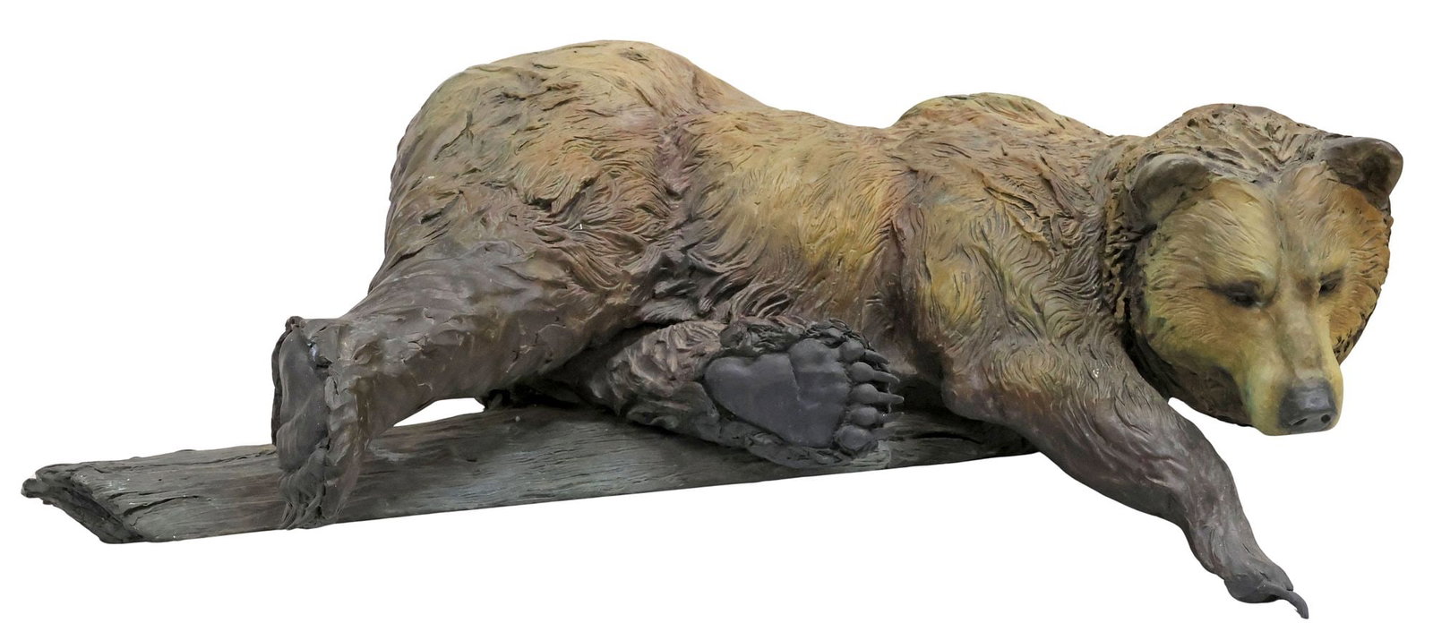 ERIC THORSEN (B.1967) BRONZE WILDLIFE SCULPTURE, BEAR ON BRANCH, 35"L: Large patinated bronze sculpture, Reclining Bear on Branch, signed in cast Eric Thorsen (Montana, b.1967), dated [19]97, numbered 49/ 450, evidence of outdoor use, approx 12"h, 35"l, 16"w, 76lbs