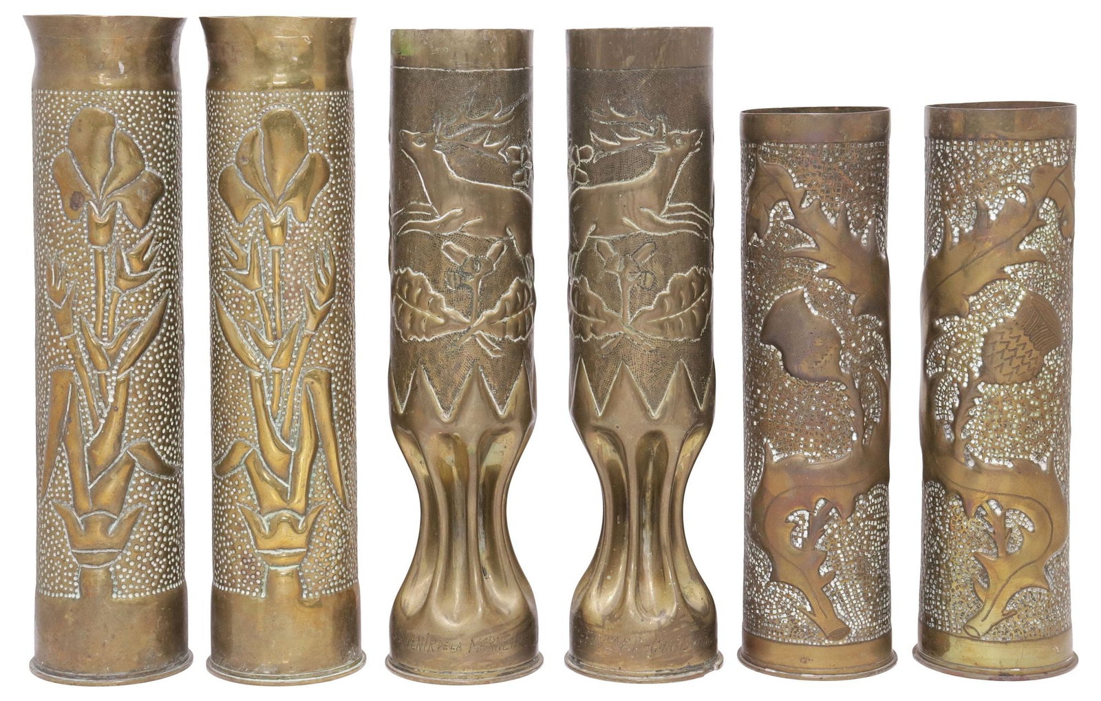 (6) FRENCH WWI-ERA TRENCH ART ARTILLERY SHELL VASES: (lot of 6) French WWI-era trench art vases, fashioned from artillery shells, including: (pair) having leaping stag motifs, over waisted body, inscribed "Souvenir de la Marne, 1914-1918" and "Breton Fo