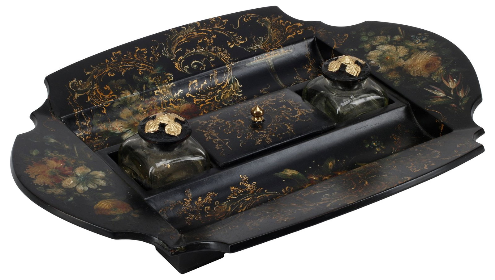 JENNENS & BETTRIDGE ENGLISH VICTORIAN PAPIER-MACHE FLORAL PAINTED INKSTAND: English Victorian papier-mache inkstand, Jennens and Bettridge, London, 19th c., the shaped tray with black lacquered ground, painted with gilt flourishes and polychrome flowers, fitted with two glass