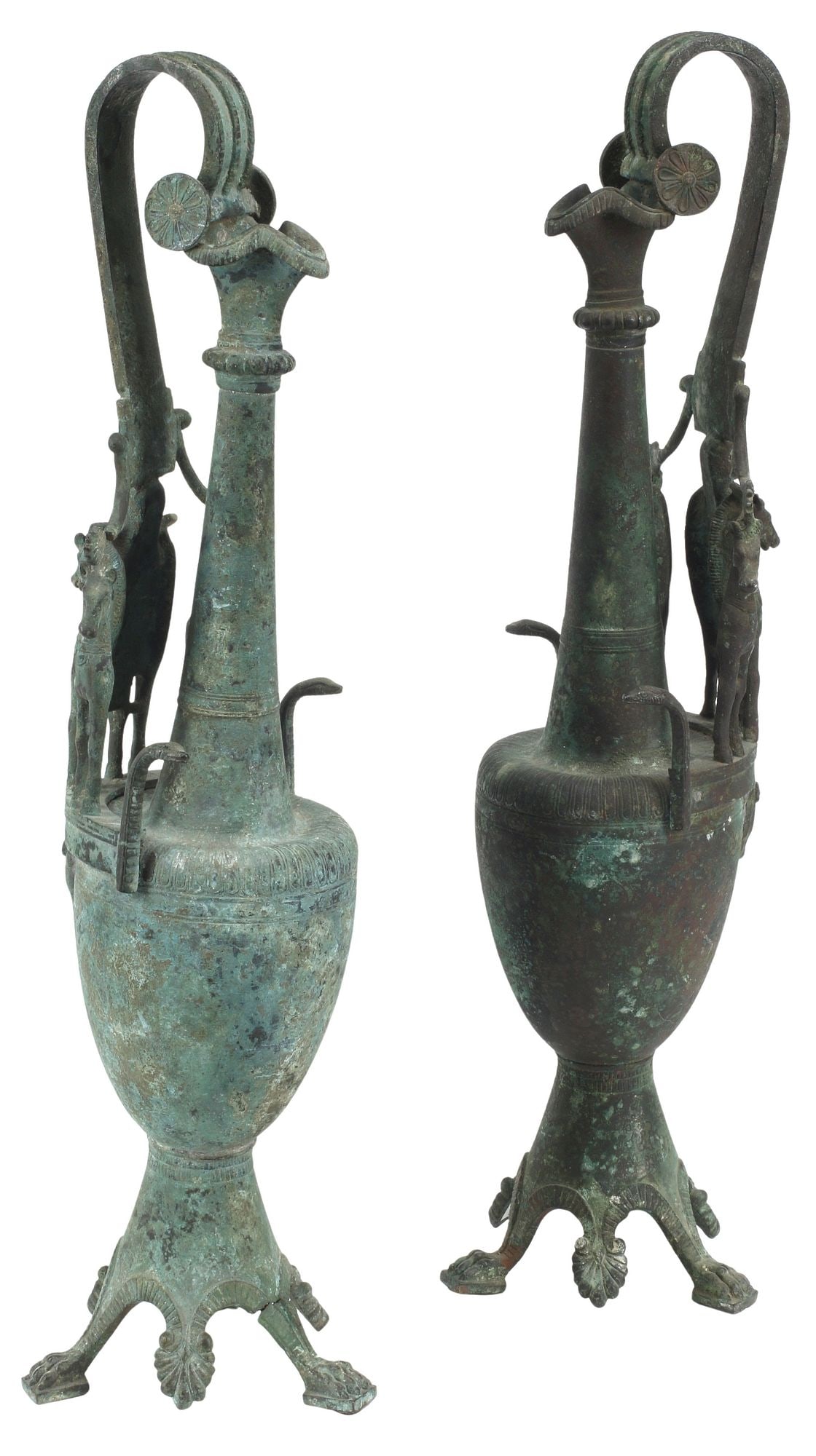 (2) ETRUSCAN STYLE VERDIGRIS PATINATED FIGURAL BRONZE EWERS: (pair) Etruscan style verdigris-patinated bronze ewers, each having arched and reeded handle, over figure and horse motifs, tapering vasiform body with central lion mask, terminating on paw feet, (one