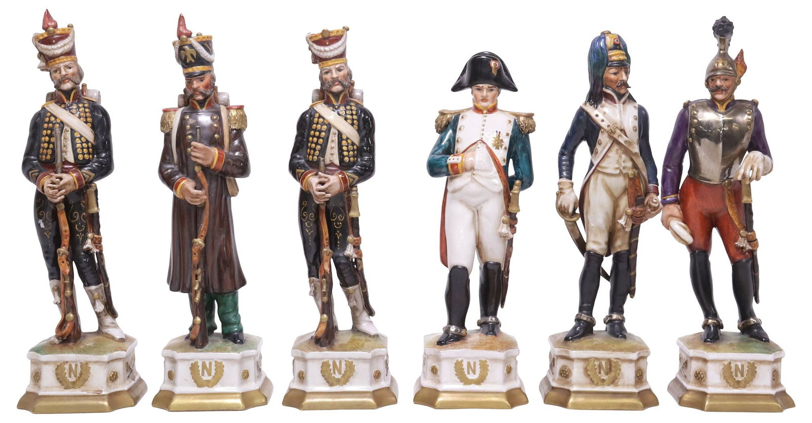 (6) BATIGNANI CERAMICHE PORCELAIN NAPOLEONIC ERA SOLDIER FIGURES: (lot of 6) Porcelain figures, Batignani Ceramiche, Italy, 20th c., modeled as soldiers of the Napoleonic Wars era, each figure rising on a pedestal with "N" within a wreath, signed Batignani to base, 