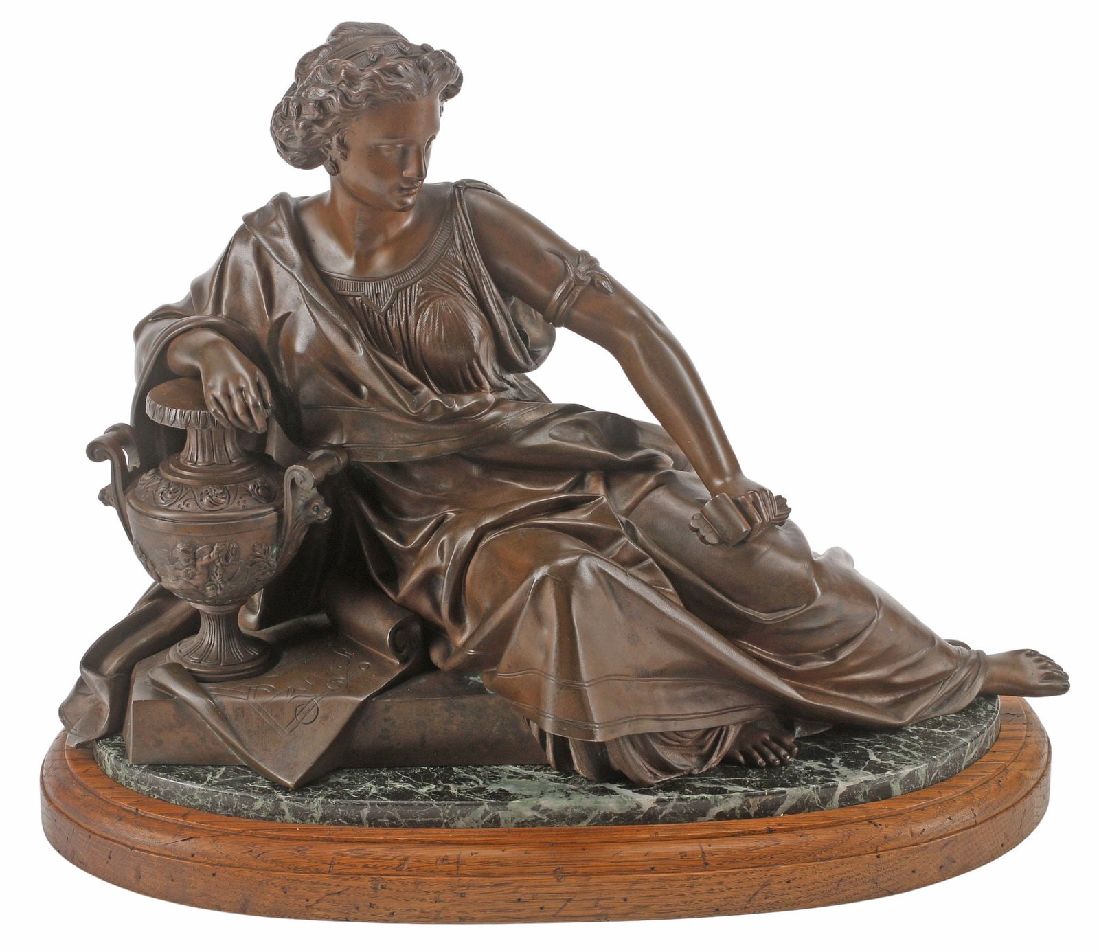 PATINATED BRONZE SCULPTURE ON MARBLE BASE, RECLINING CLASSICAL MAIDEN: Patinated bronze sculpture, Reclining Classical Maiden, modeled as a draped female figure seated beside an urn, on integral green marble base and wood stand, overall: approx 14"h, 16"w, 10"d, 32.75lbs