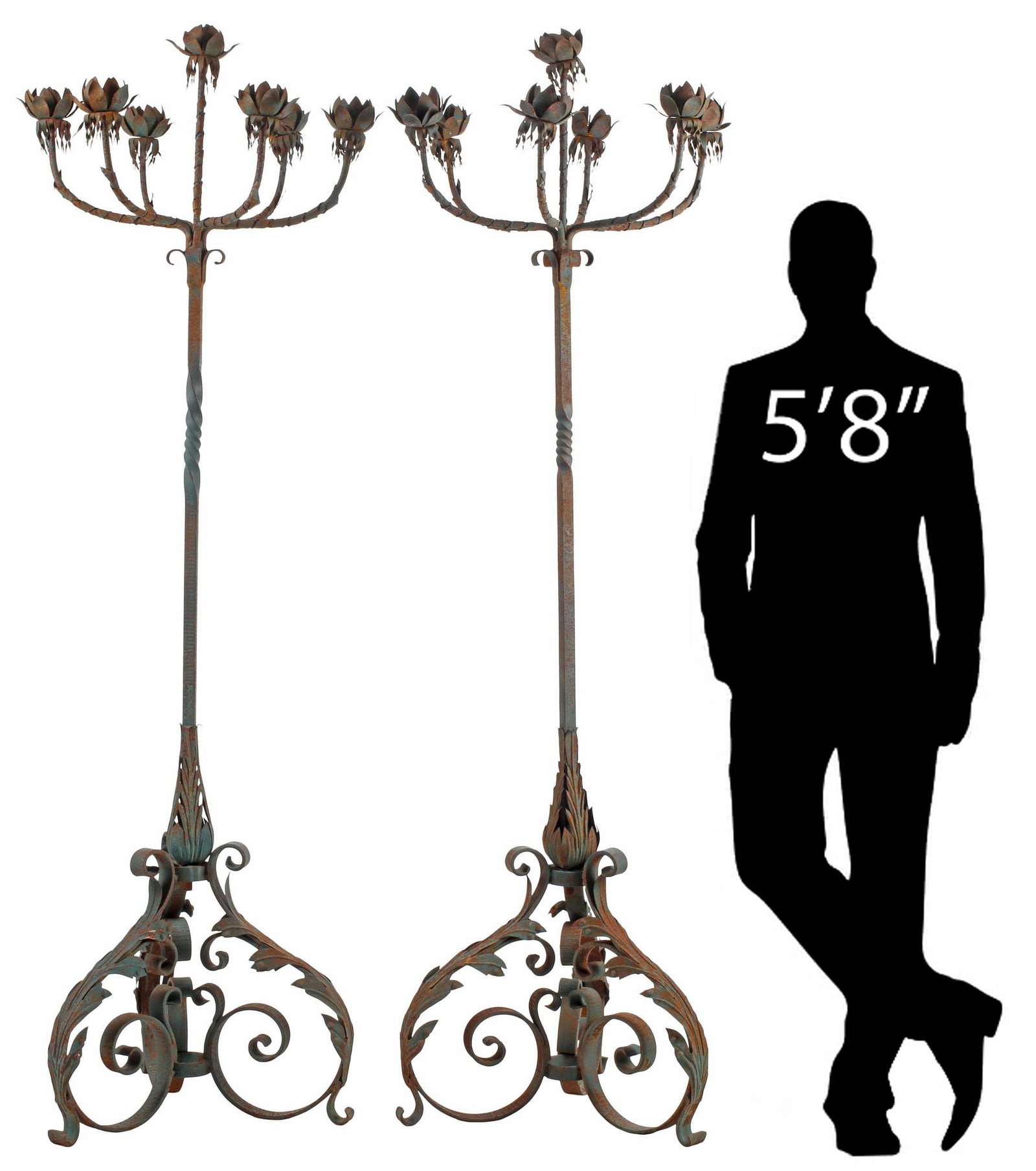 (2) SPANISH STYLE WROUGHT IRON 7-LIGHT FLOOR CANDELABRA, 78"H: (pair) Spanish style wrought iron seven-light floor candelabra, each with curved arms terminating at floriform bobeche with candle pricket, on scrolled acanthus tripartite base, not currently