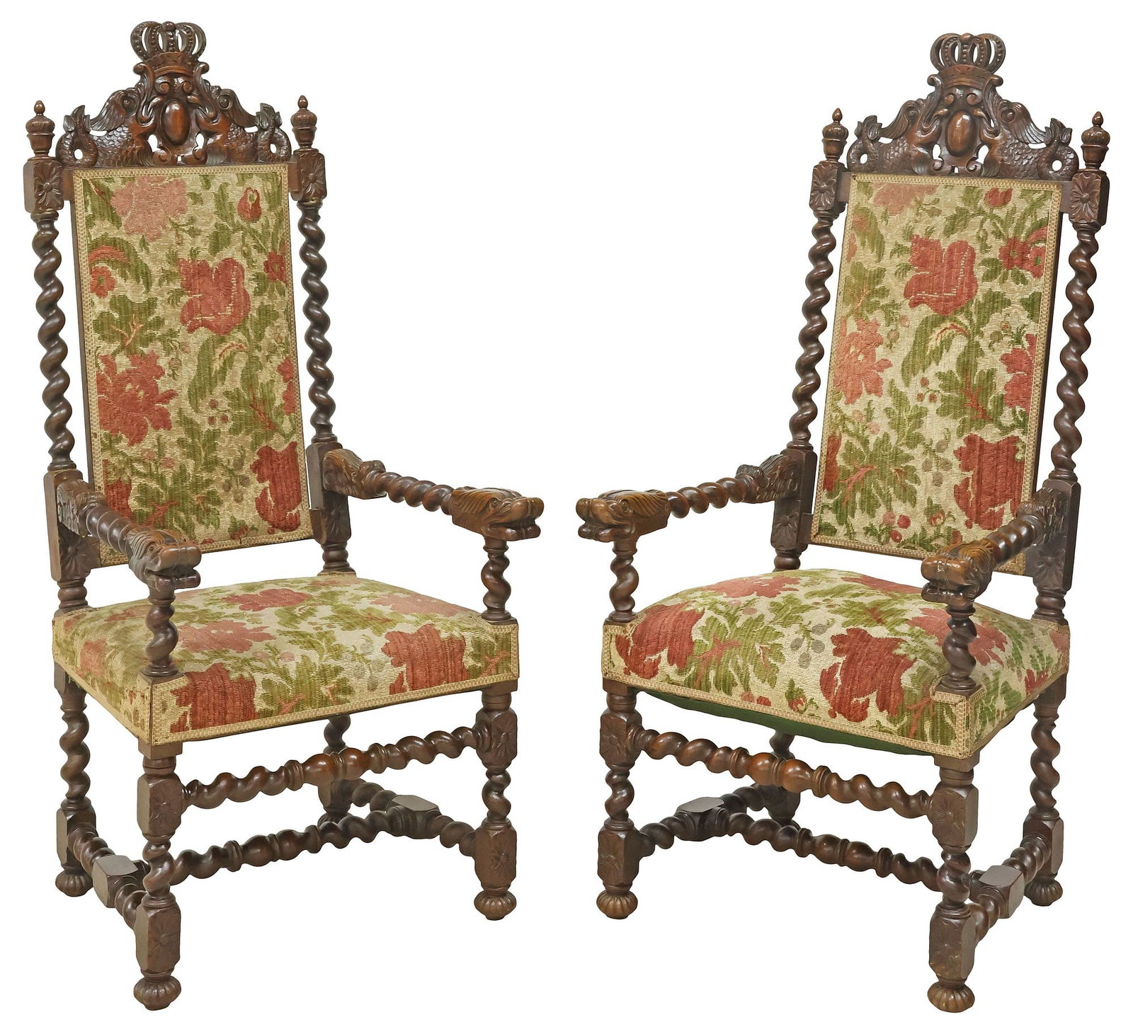 (2) FRENCH HENRI II STYLE CARVED WALNUT UPHOLSTERED ARMCHAIRS: (pair) French Henri II style carved walnut armchairs/ fauteuils, late 19th c., crown crest with sea serpents framing shield, back and seat in jacquard upholstery, framed by spiral-turned supports, arm