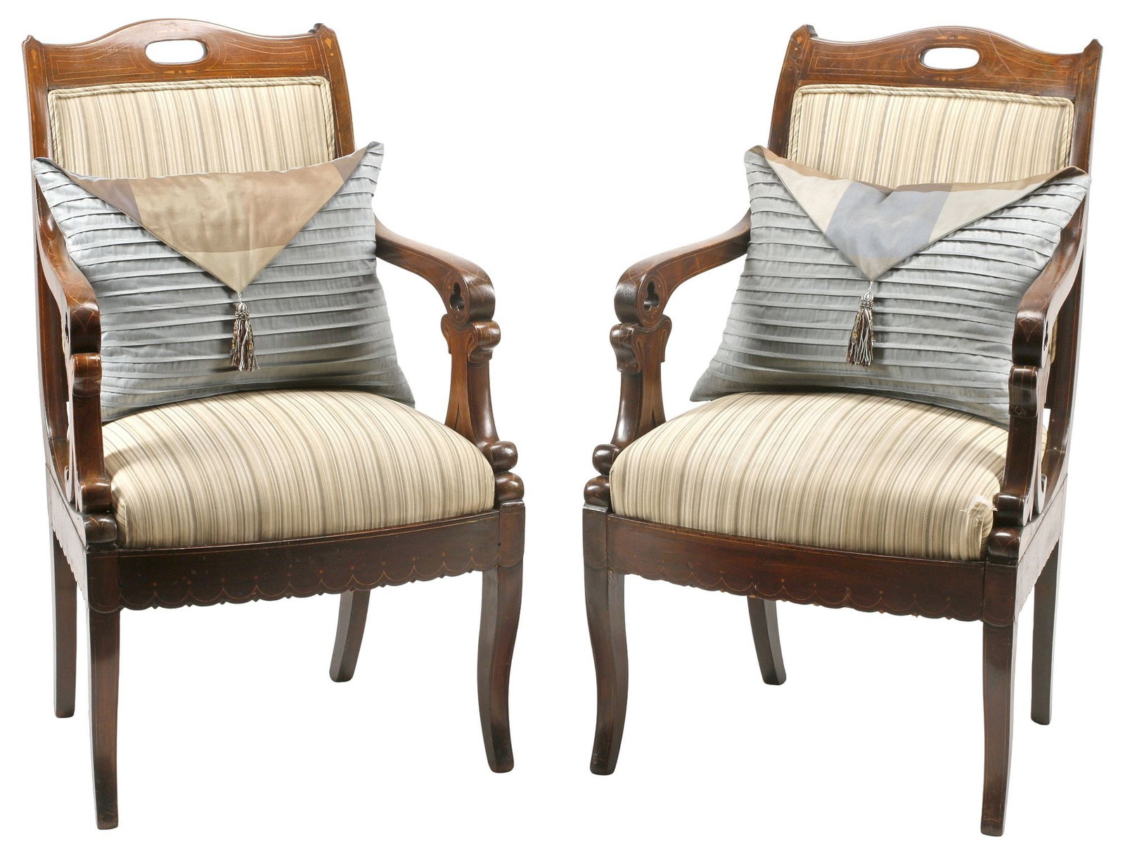 (2) FRENCH LOUIS PHILIPPE STRING-INLAID WALNUT ARMCHAIRS & PILLOWS: (pair) French Louis Philippe stringwork-inlaid walnut armchairs/ fauteuils, mid 19th c., each in later striped fabric upholstery, arms with pierced trefoil terminals, rising on flared legs, accompanie