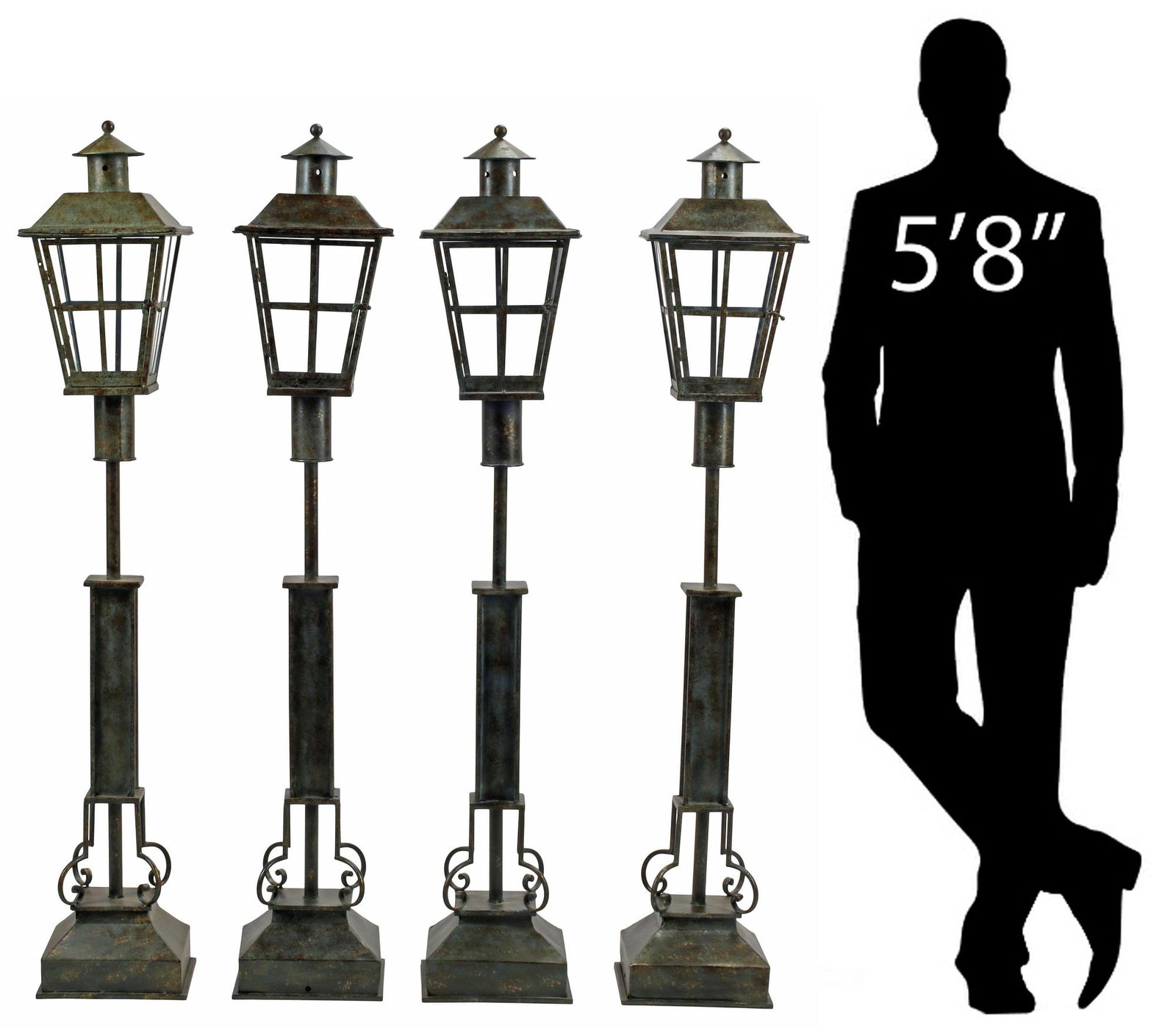 (4) PATINATED IRON & TOLE STANDING FLOOR LANTERNS, 62"H: (lot of 4) Patinated iron and tole standing floor lanterns, each with tapering square shade, rising on rectangular standard and scrolled base, not currently electrified, approx 62"h, 11"w, 11"d