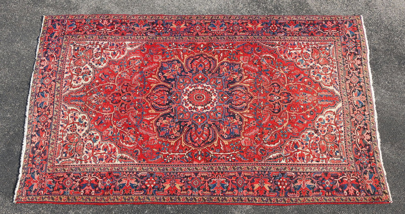 LARGE ESTATE HAND-TIED RUG, 11'5" X 8'5.5": Estate hand-tied rug, approx 11'5"l, 8'5.5"w **Provenance: Treasures from the vaults of a Dallas designer** **Please Note: All of the rugs offered in this auction would likely benefit from a professio