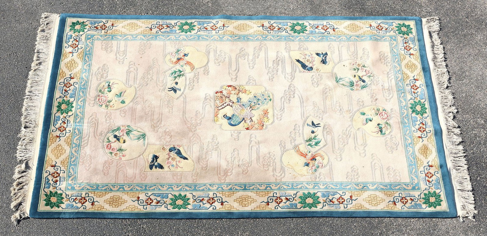 ESTATE HAND-TIED CHINESE RUG, 9'2" X 6': Estate Chinese hand-tied rug, with birds, clouds and foliate motifs, approx 9'2"l, 6'w **Provenance: Dallas, Texas: When the madness of collecting collides with connoisseurship** **Please Note: All of