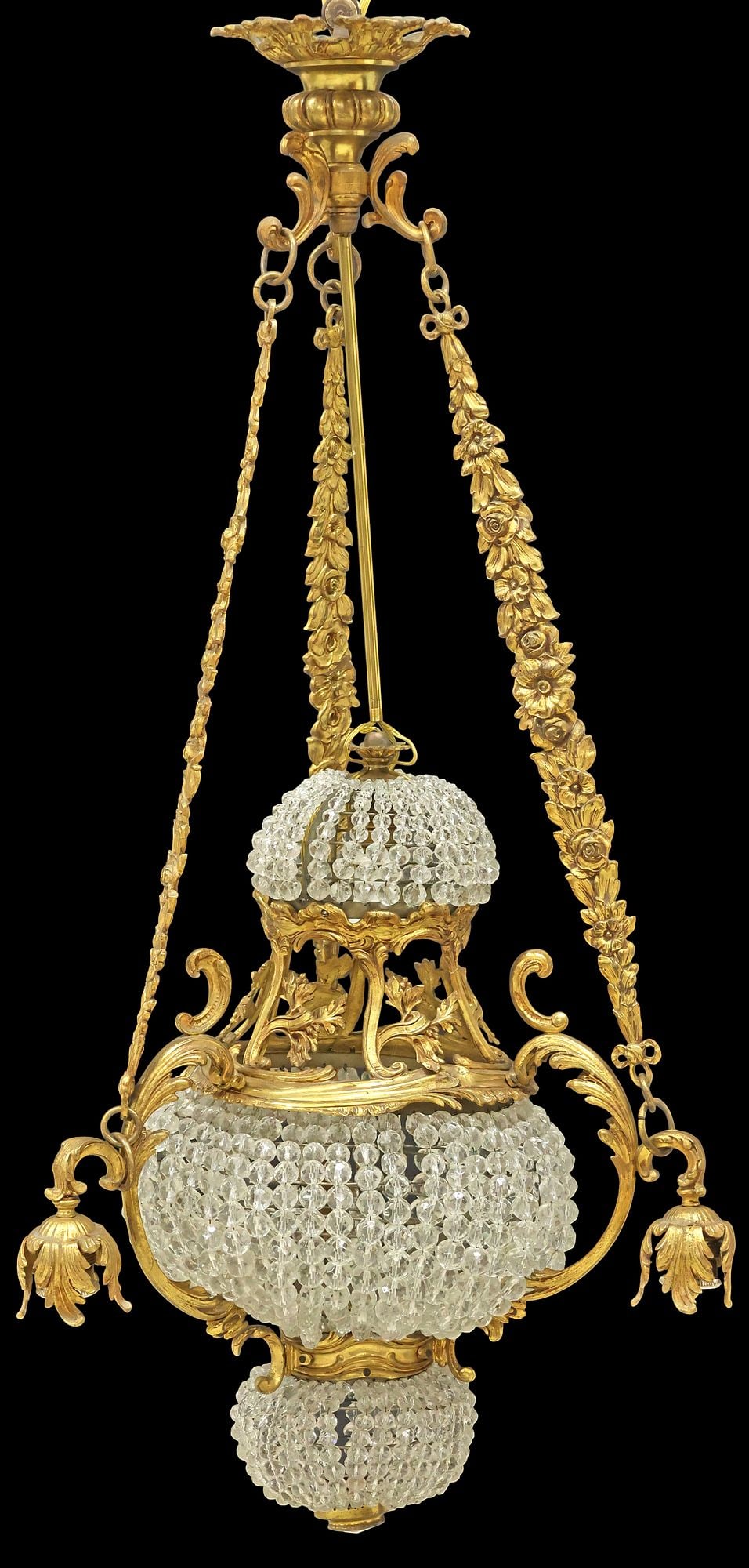 FRENCH GILT-METAL & CRYSTAL-BEADED 4-LIGHT CHANDELIER: French gilt-metal four-light chandelier, 20th c., tiered frame with three crystal-beaded globes and central register of openwork scrolling foliates, enclosing three lights, floral suspension terminati