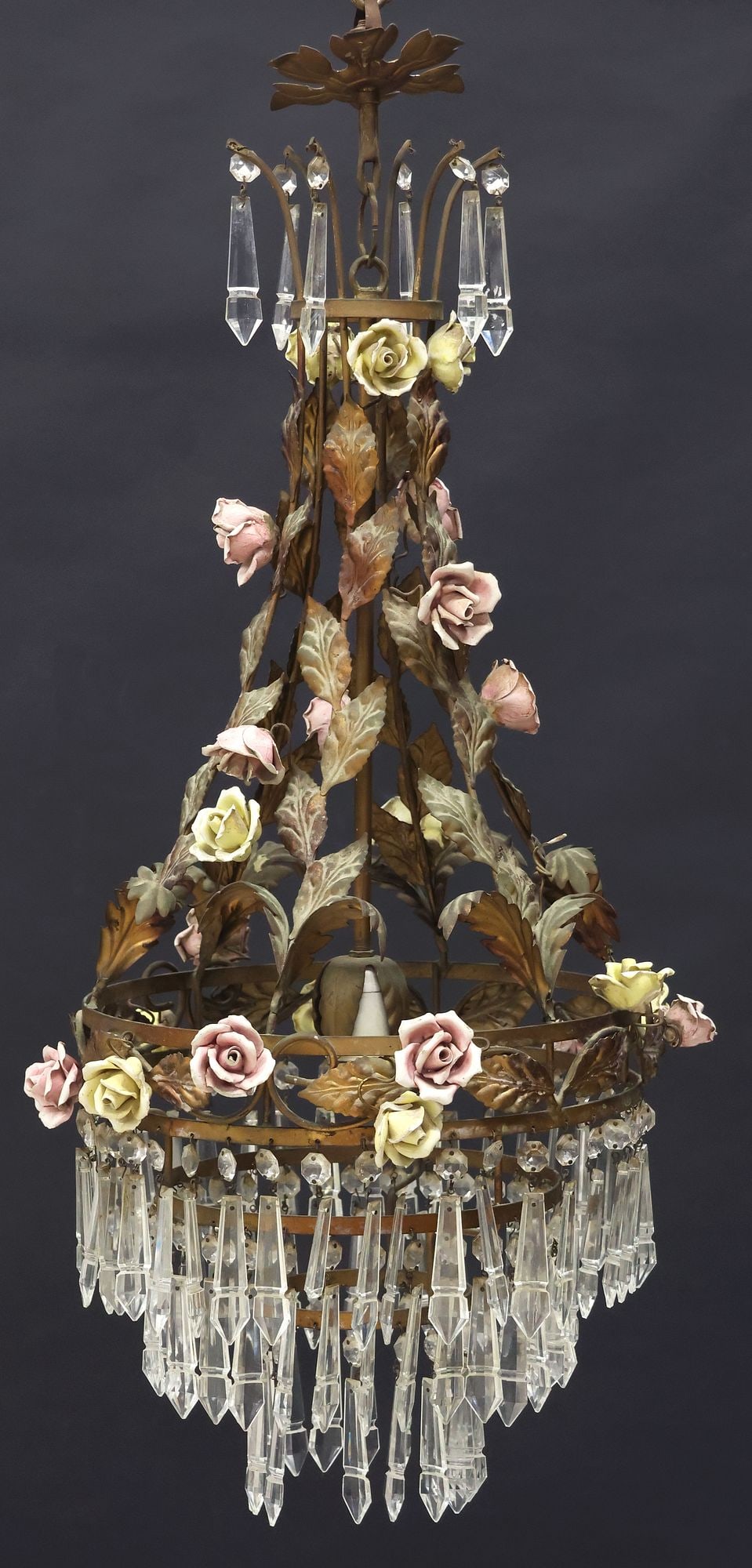 ITALIAN GILT IRON & CRYSTAL 1-LT CHANDELIER WITH PORCELAIN ROSES: Italian gilt-iron single-light chandelier, 20th c., foliated supports with pink and yellow glazed porcelain roses, suspending tiered hoop frame, hung with crystal beads and prisms, in need of wiring, 