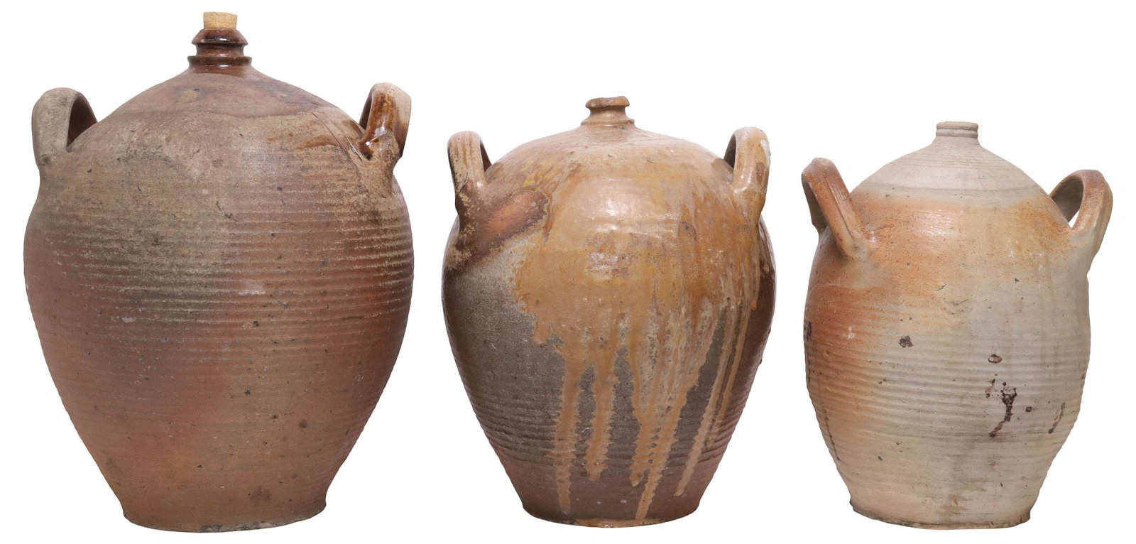 (3) FRENCH PROVINCIAL STONEWARE OIL JUGS: (lot of 3) French Provincial stoneware oil jugs, each with dual side handles, over tapered body, (two) retaining stopper, largest: approx 16.5"h, 11.5"diam, 27lbs total