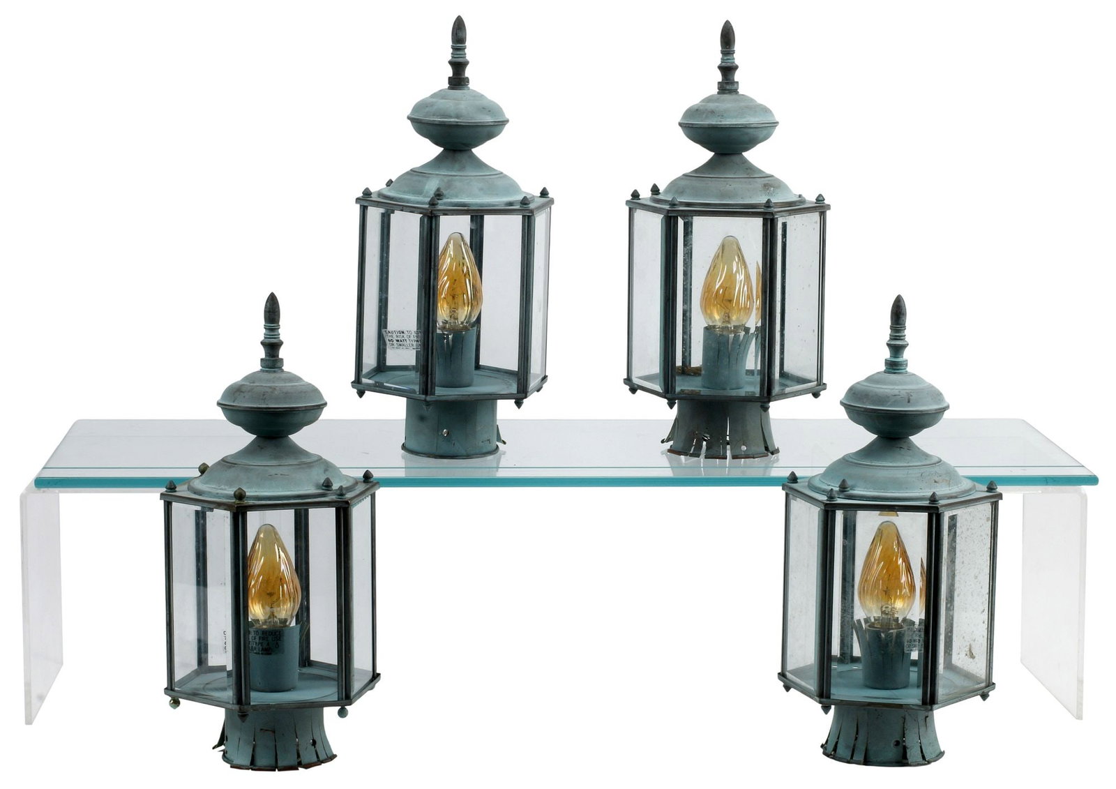 (4) GREEN-PAINTED TOLE LANTERNS: (lot of 4) Green-painted tole lanterns, metal socket housing and mounting collars intact with numerous radial splits, in need of wiring, approx 15"h, 6.5"diam, 13lbs total