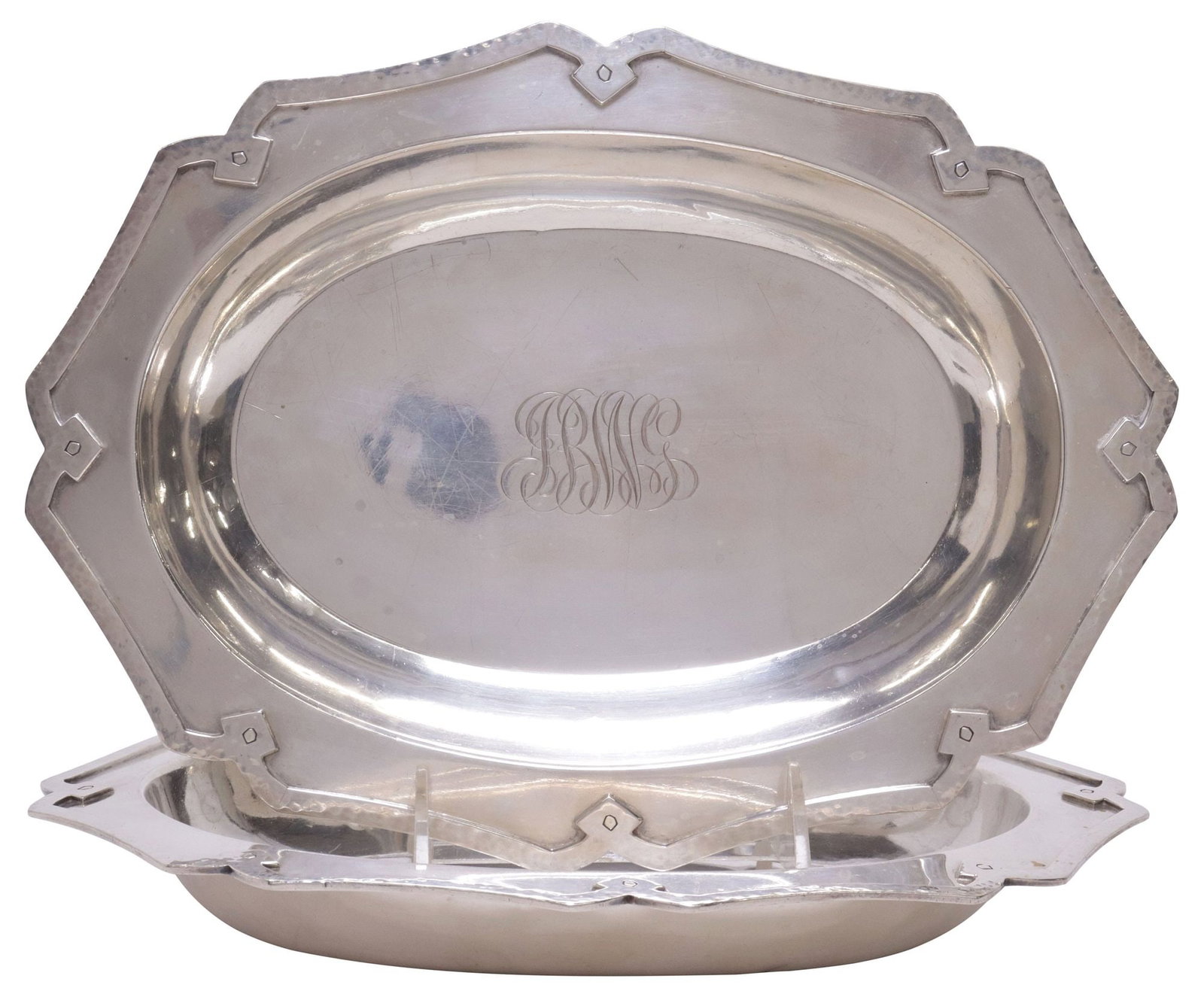 (2) MAUSER ARTS & CRAFTS STERLING SILVER SWEETMEAT DISHES, 31.49OZT: (pair) American Arts and Crafts Movement sterling silver sweetmeat dishes, Mauser Manufacturing Company, late 19th c., each having scalloped border with hammered trim, quadruple monogram in basin, mar