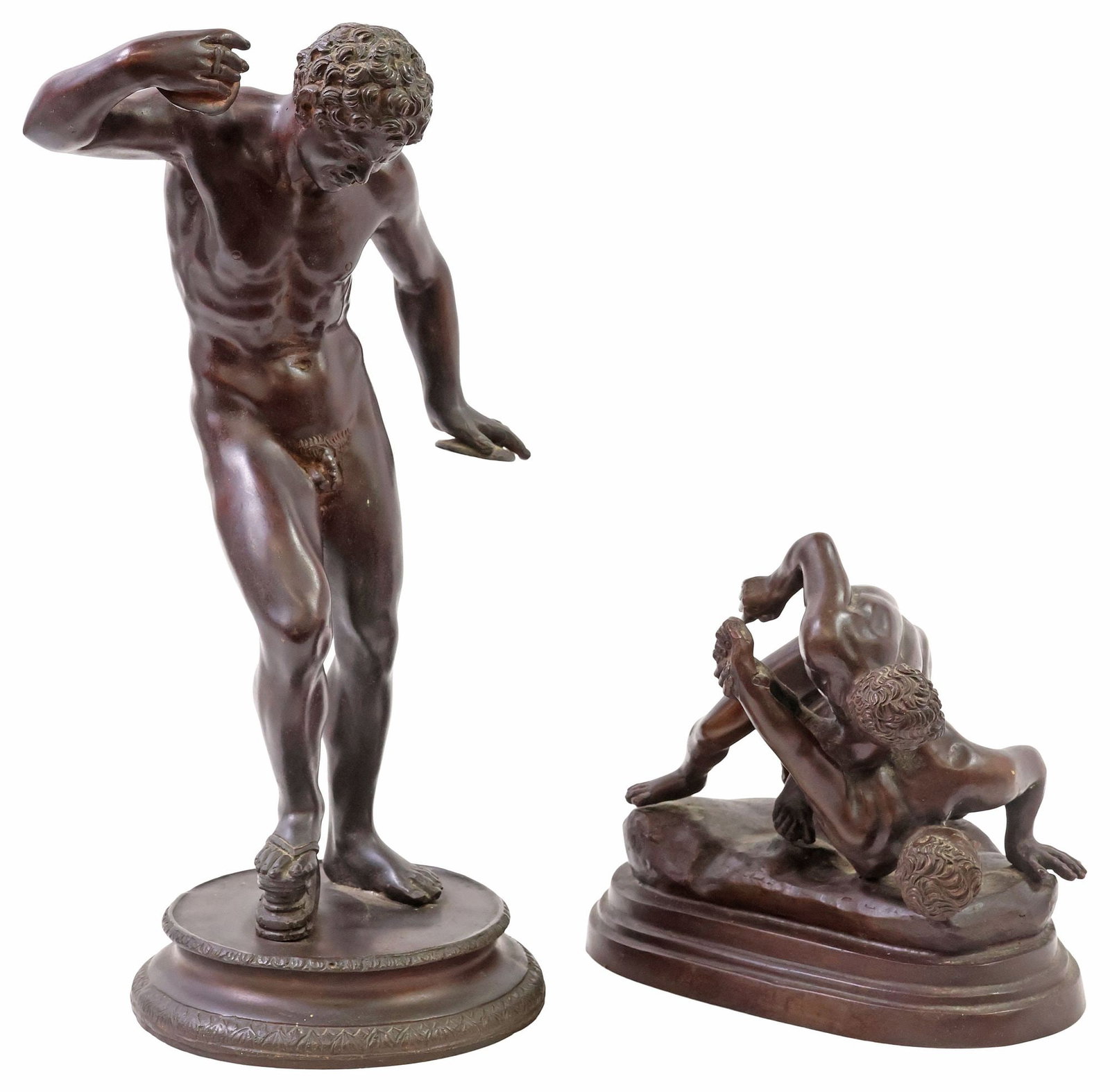 (2) GRAND TOUR STYLE BRONZES, 'DANCING FAUN' & 'THE WRESTLERS': (lot of 2) Grand Tour style patinated bronze sculptures, including: (1) "Dancing Faun," after Pietro Cipriani (Italian, 1680-1745), modeled as a satyr with cymbals in each hand, approx 13.5"h, 8"w, 5.