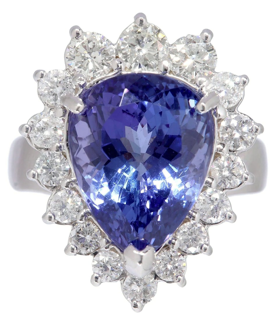 FINE ESTATE 14K WG, 11.30CT TANZANITE & 1.25CTTW DIAMOND COCKTAIL RING: Estate 14kt white gold ring, pear-shaped tanzanite, approx 11.30ct, framed by sixteen round diamonds, approx 1.25cttw, average color: F, average clarity: VVS2, one top diamond slightly loose, approx