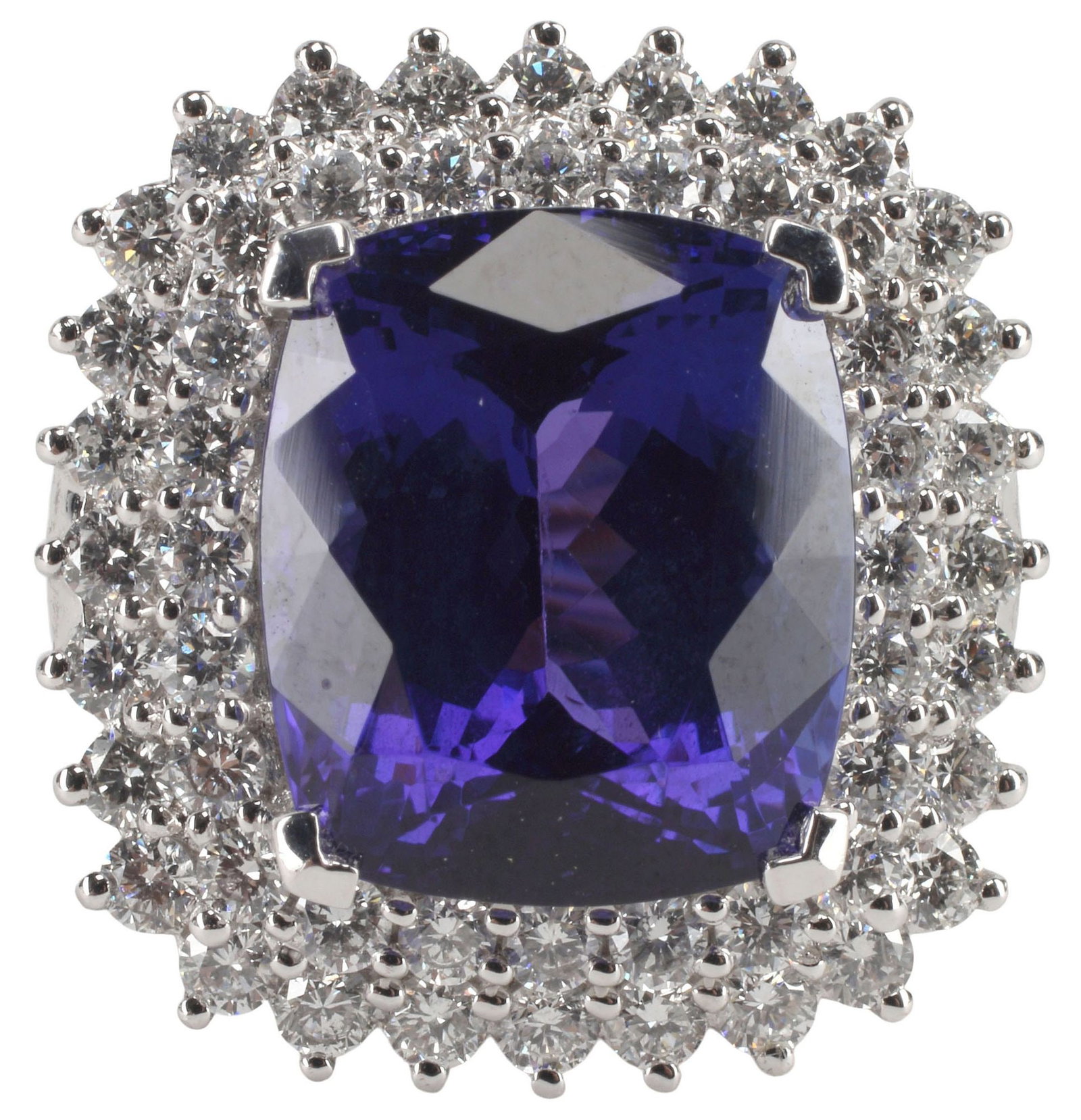 ESTATE DESIGNER RHAPSODY PLATINUM, 9.00CT TANZANITE & 1.25CTTW DIAMOND RING: Estate designer platinum and gemstone ring, Rhapsody, central cushion-cut tanzanite, approx 9.00cts, in a double halo surround of (fifty-two) round brilliant-cut diamonds, approx 1.25cttw, average