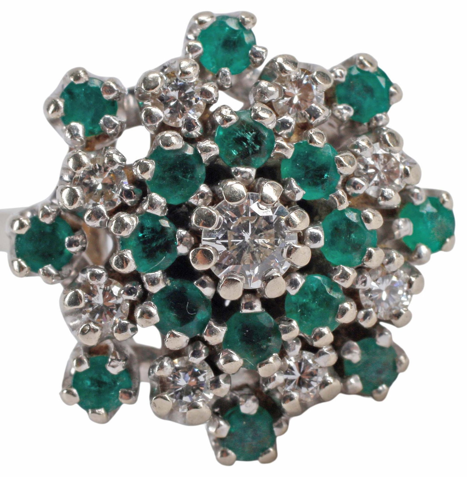 ESTATE 14KT WHITE GOLD EMERALD & DIAMOND CLUSTER COCKTAIL RING: Estate 14kt white gold, diamond and emerald cluster ring, nine (9) round brilliant cut diamonds, approx 0.42cttw, average color: H-I, average clarity: SI, sixteen (16) round emeralds, approx
