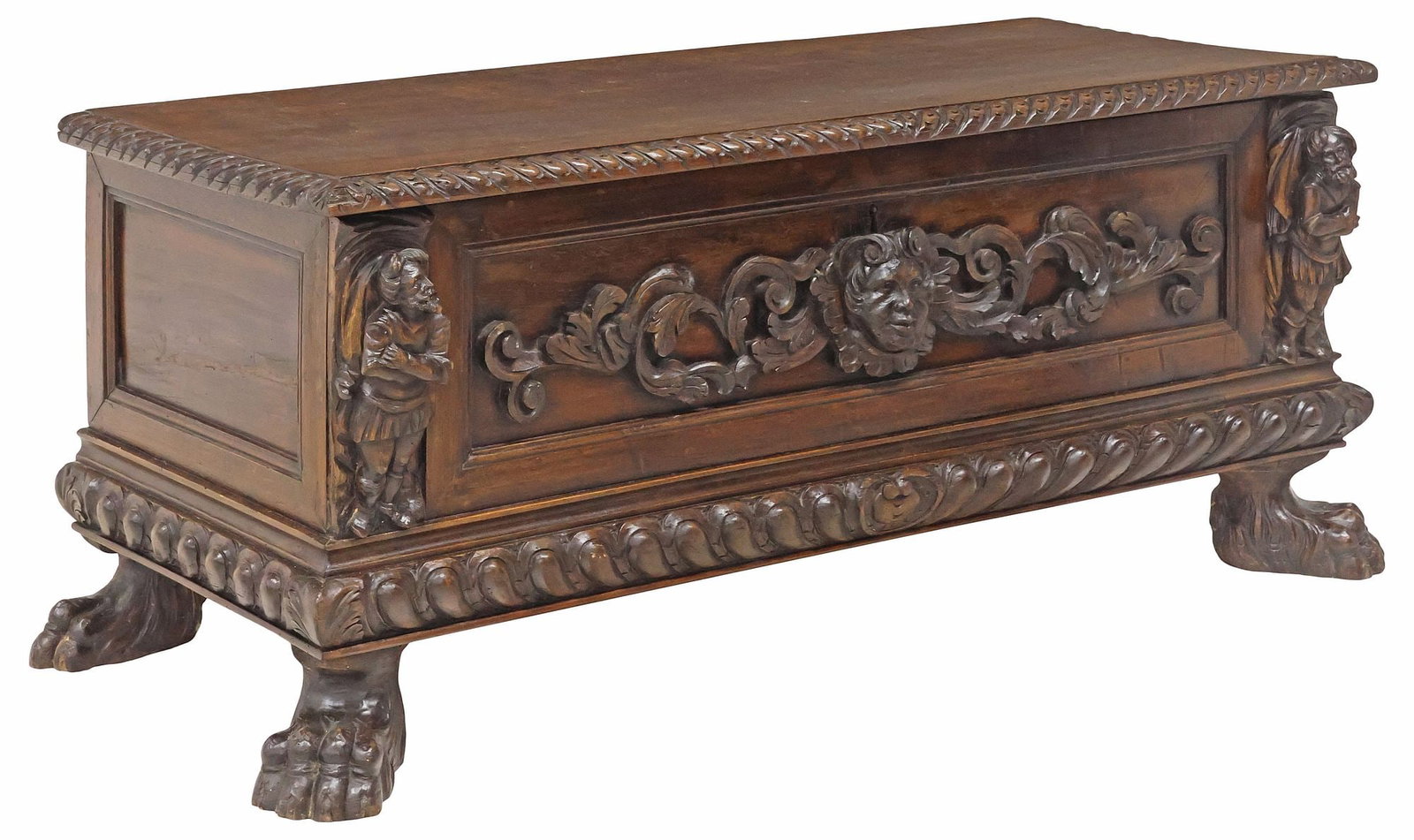 ITALIAN RENAISSANCE STYLE CARVED WALNUT FIGURAL COFFER, 18TH C.: Italian Renaissance style walnut storage chest/ coffer, 18th c., hinged top with gadrooned trim, revealing open interior storage, front facade with scrolling foliates flanked by knightly figures carve