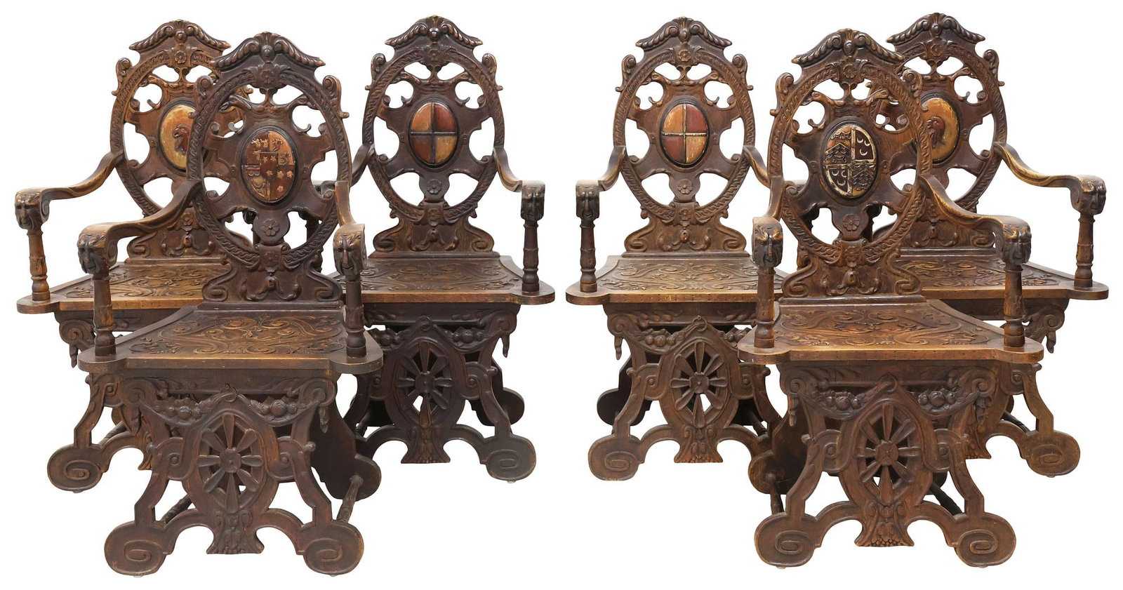 (6) CONTINENTAL RENAISSANCE REVIVAL CARVED OAK HERALDIC TRESTLE CHAIRS: (lot of 6) Continental Renaissance Revival carved oak armchairs, early 20th c., each having shell crest, over pierced splat with floral motifs and central oval cartouche, with varying paint-decorated