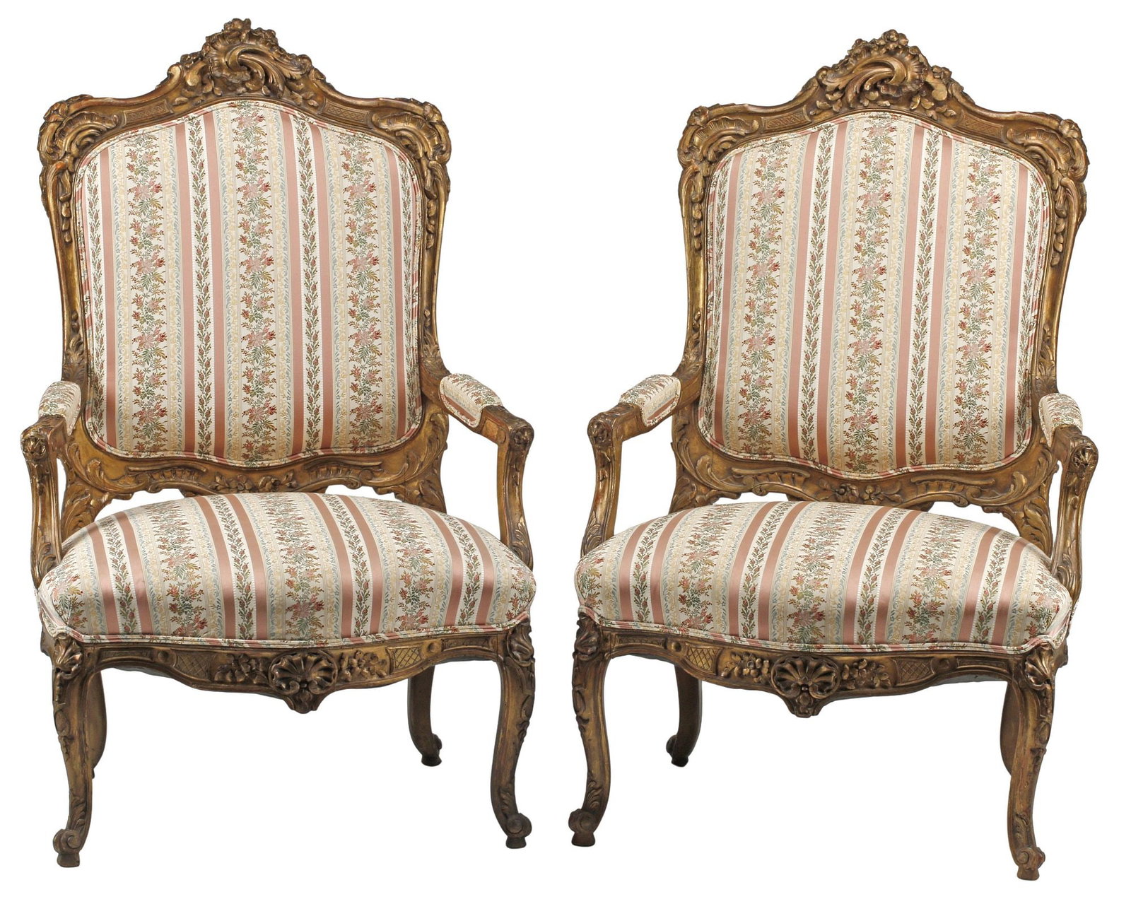 (2) LOUIS XV STYLE FLORAL-UPHOLSTERED ARMCHAIRS / FAUTEUILS: (pair) Louis XV style giltwood upholstered armchairs/ fauteuils, each in striped floral upholstery, having scrolling foliate crest, over shaped and molded back, rising on cabriole legs, ending on whor