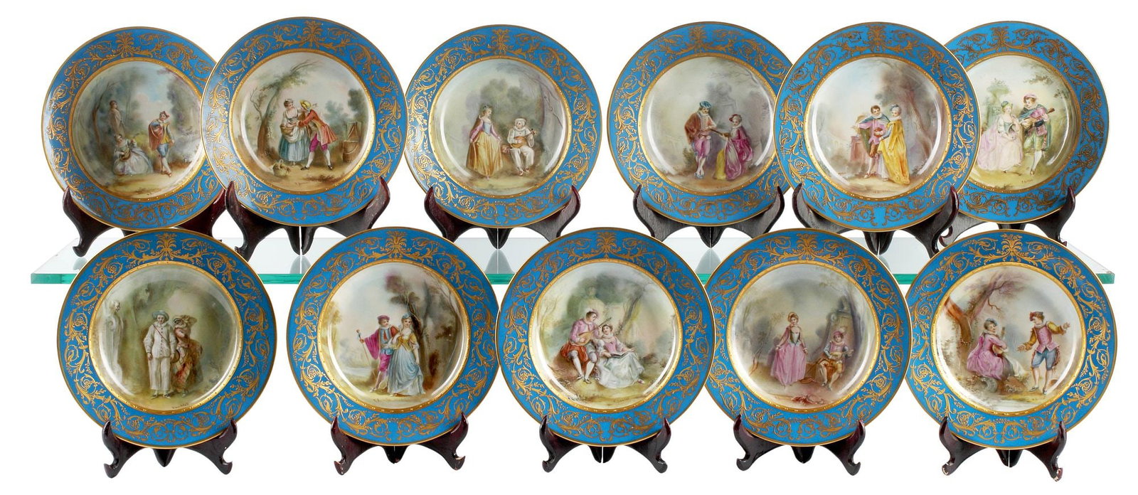 (11) FINE FRENCH SEVRES STYLE PARCEL-GILT BLEU CELESTE PORCELAIN SOUP BOWLS: (lot of 11) Fine French Sevres style parcel-gilt porcelain rim soup bowls, 19th c., each with unique hand-painted reserve depicting courting couples in forest landscape, bearing the artist's signature